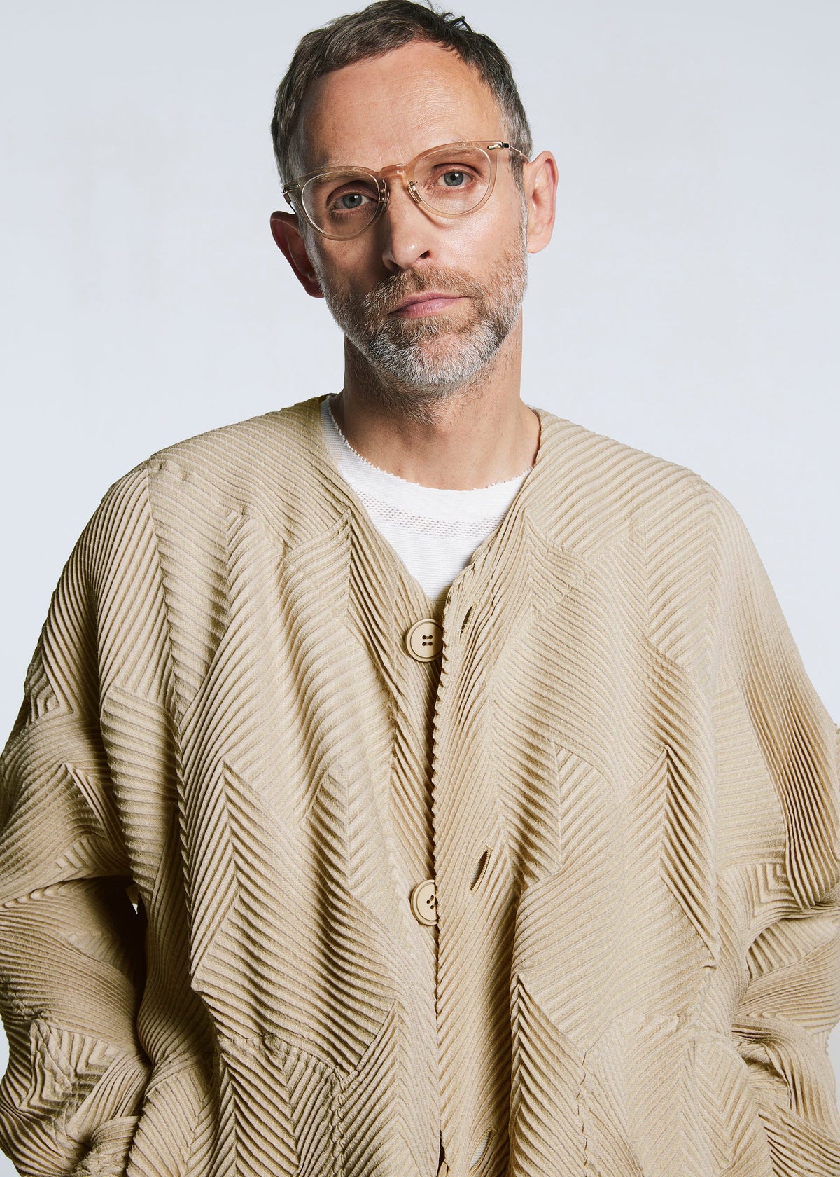A model wears the A-POC ABLE ISSEY MIYAKE TYPE O 017 coat.