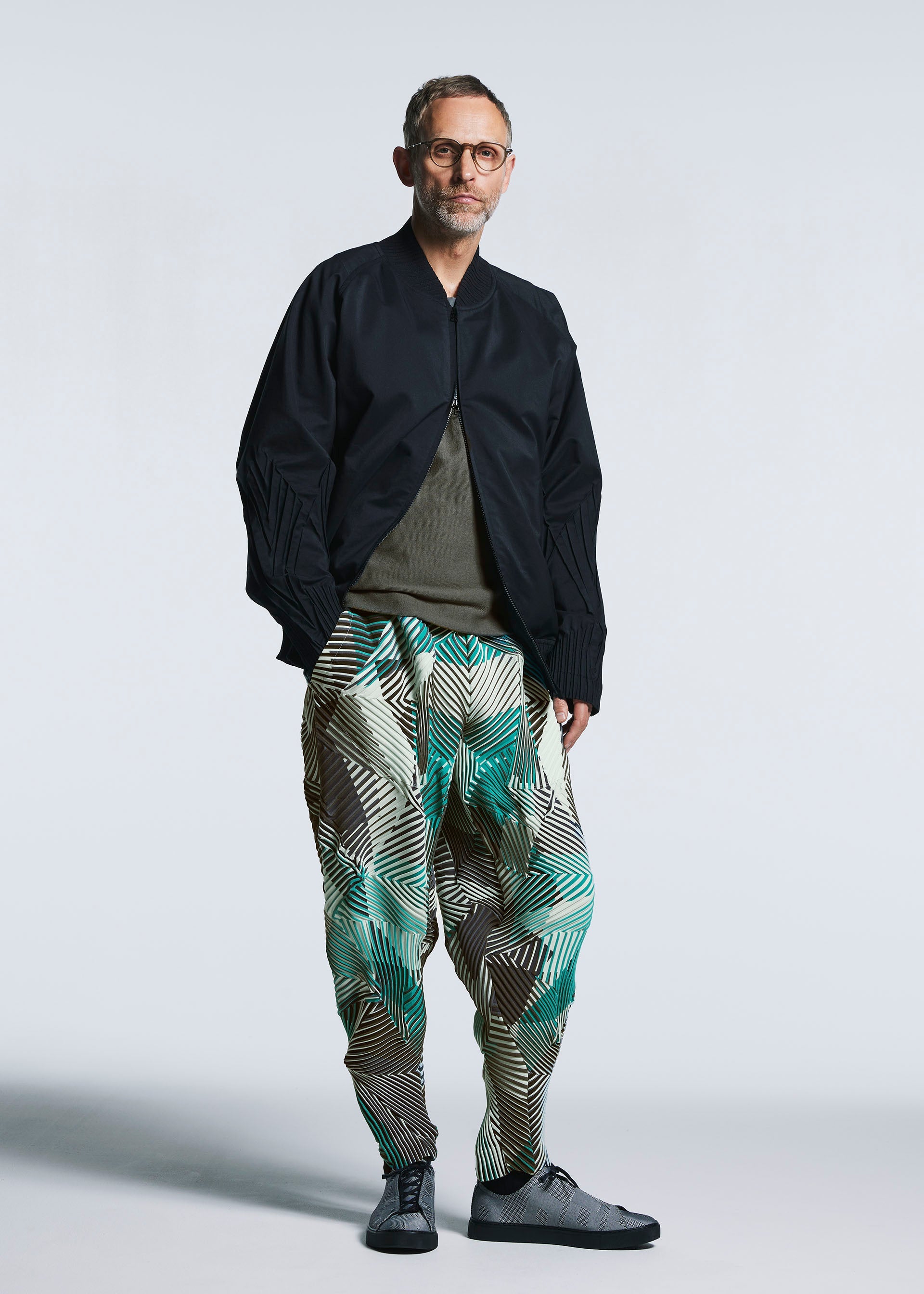 A model wears the A-POC ABLE ISSEY MIYAKE TYPE P 002 trousers.