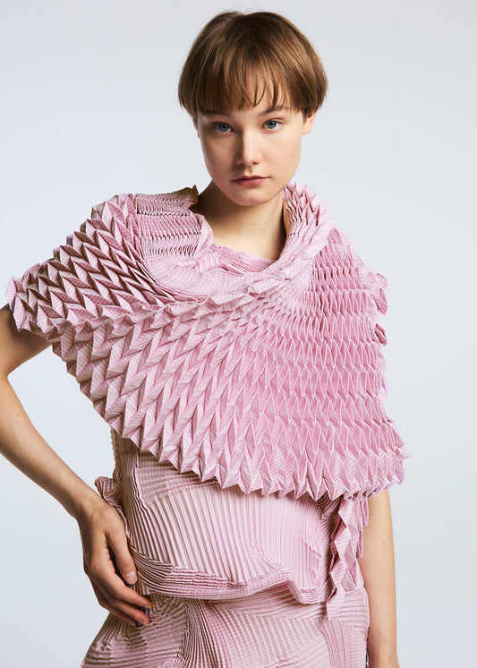 A model wears the A-POC ABLE ISSEY MIYAKE TYPE O STOLE stole.