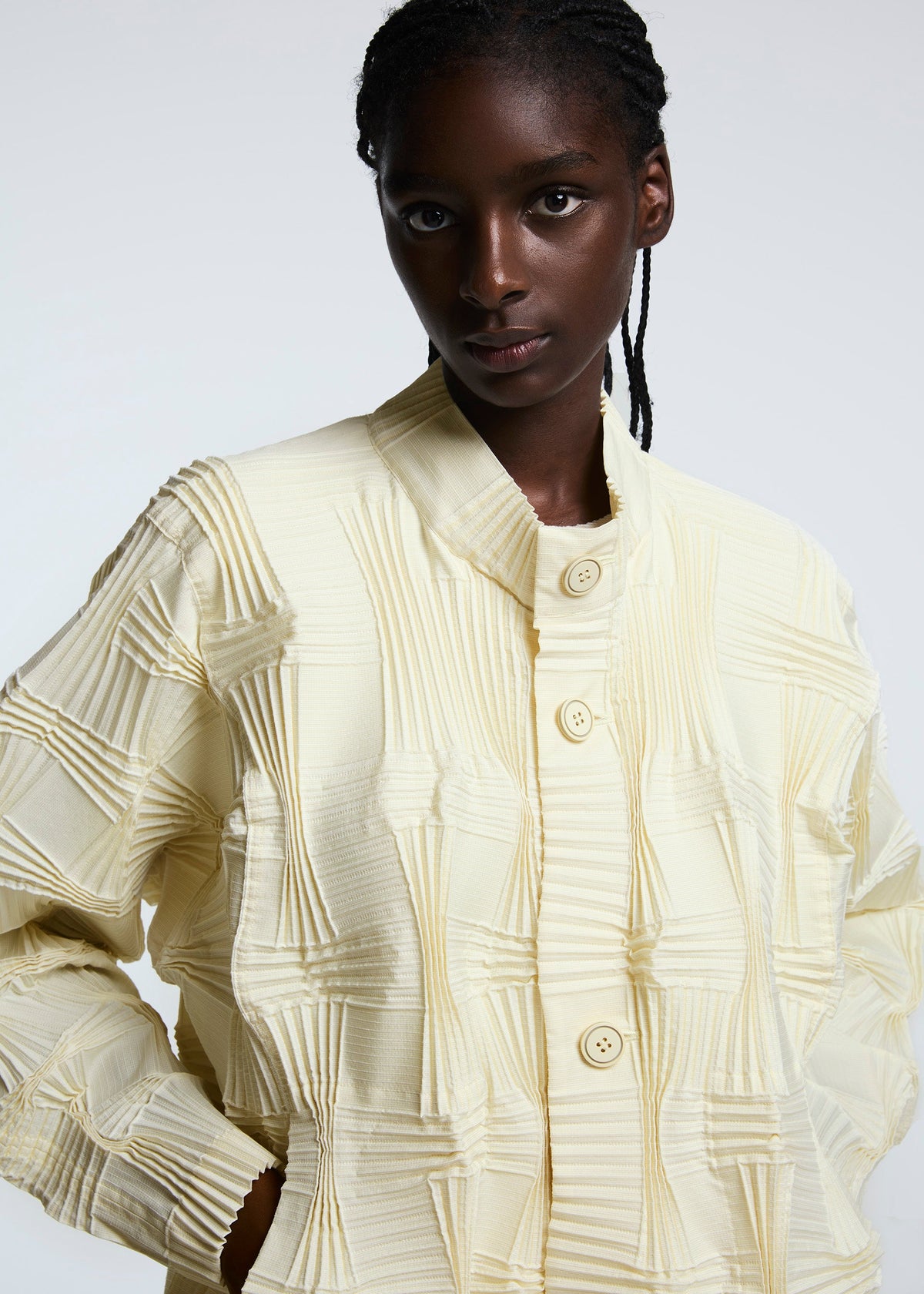 A model wears the A-POC ABLE ISSEY MIYAKE TYPE O 018 jacket.