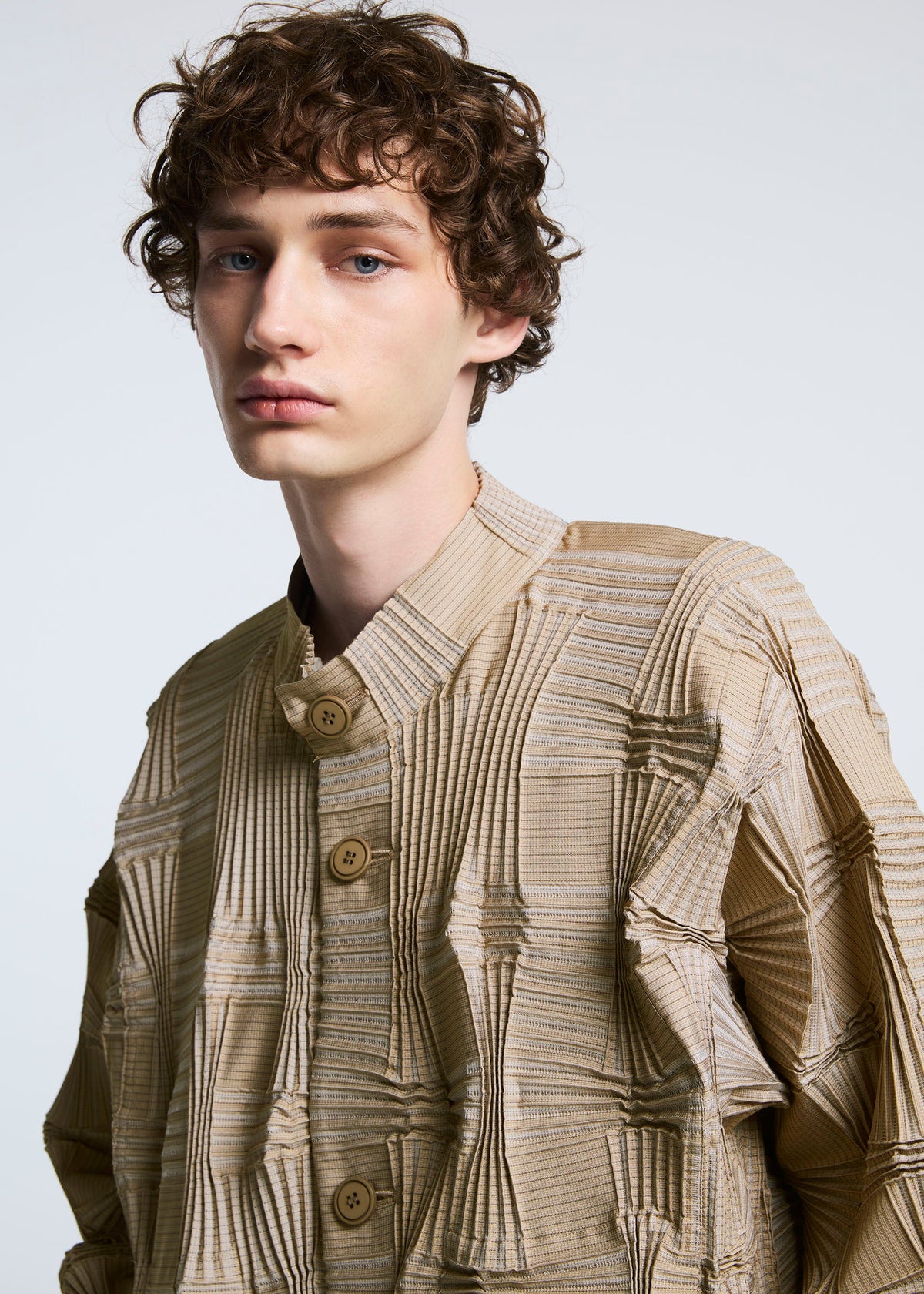 A model wears the A-POC ABLE ISSEY MIYAKE TYPE O 018 jacket.