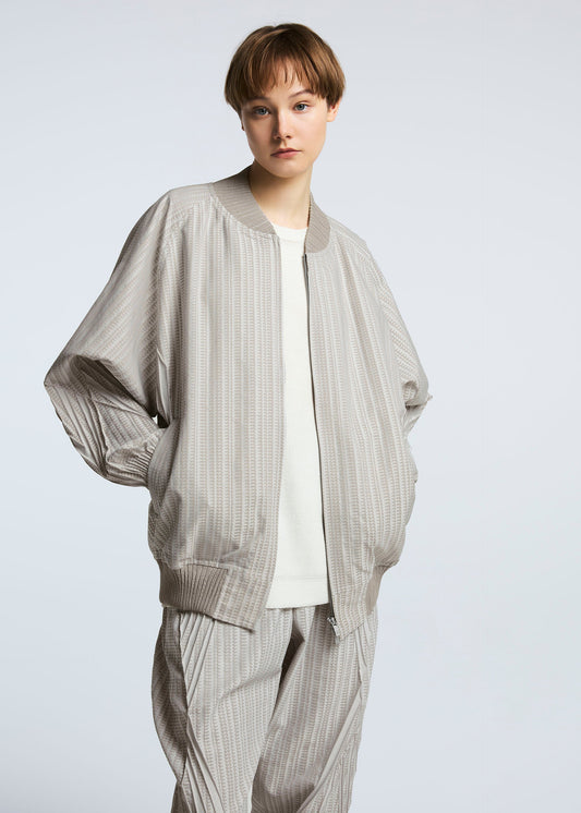 A model wears the A-POC ABLE ISSEY MIYAKE TYPE S 001 2 jacket.