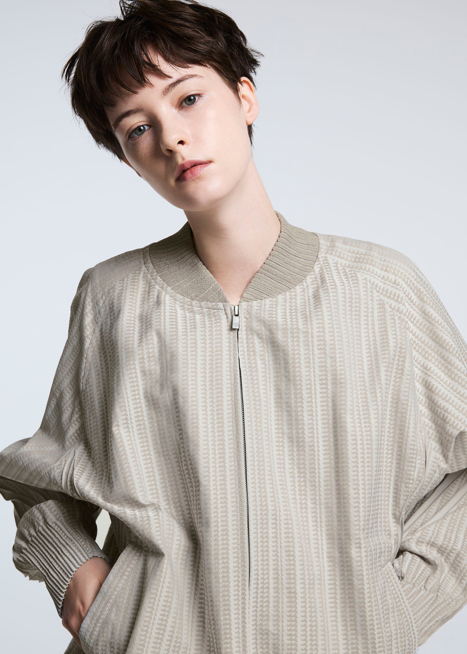 A model wears the A-POC ABLE ISSEY MIYAKE TYPE S 001 2 jacket.