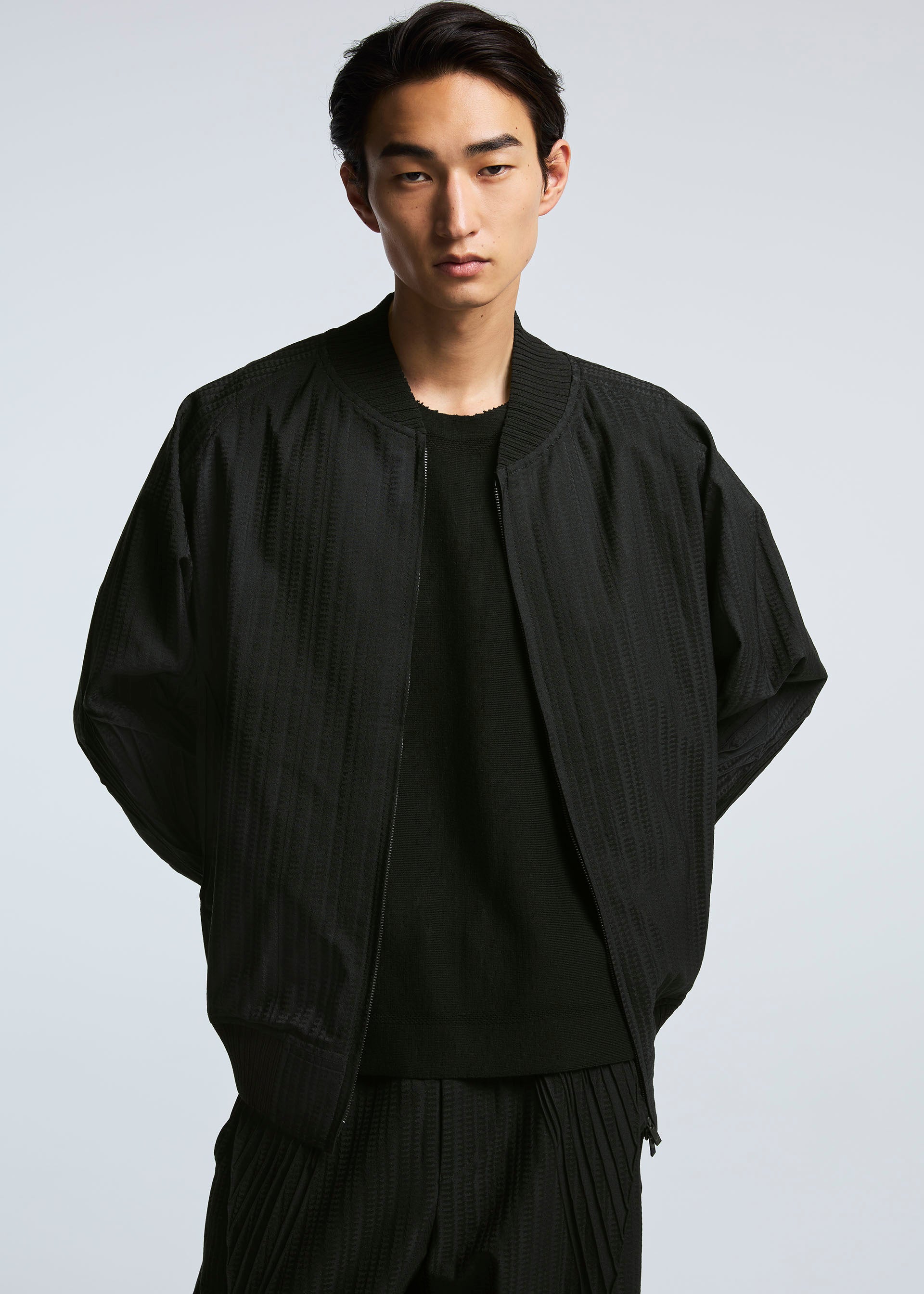 A model wears the A-POC ABLE ISSEY MIYAKE TYPE S 001 2 jacket.