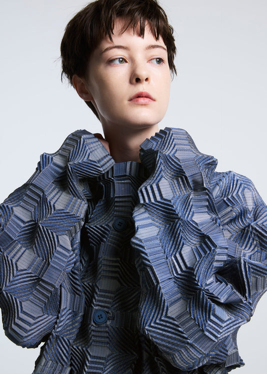 A model wears the A-POC ABLE ISSEY MIYAKE TYPE O 016 jacket.