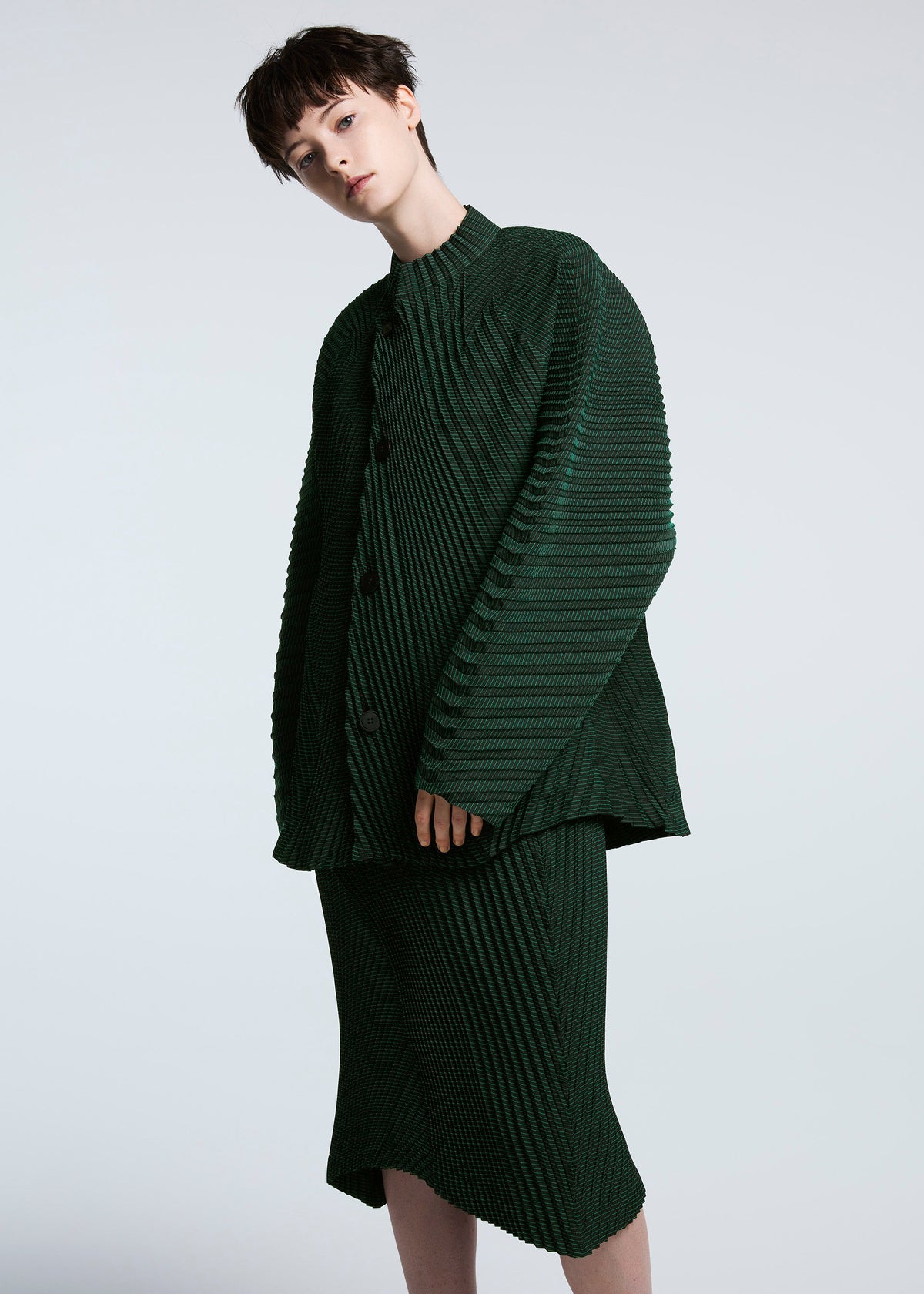 A model wears the A-POC ABLE ISSEY MIYAKE TYPE O 006 jacket.
