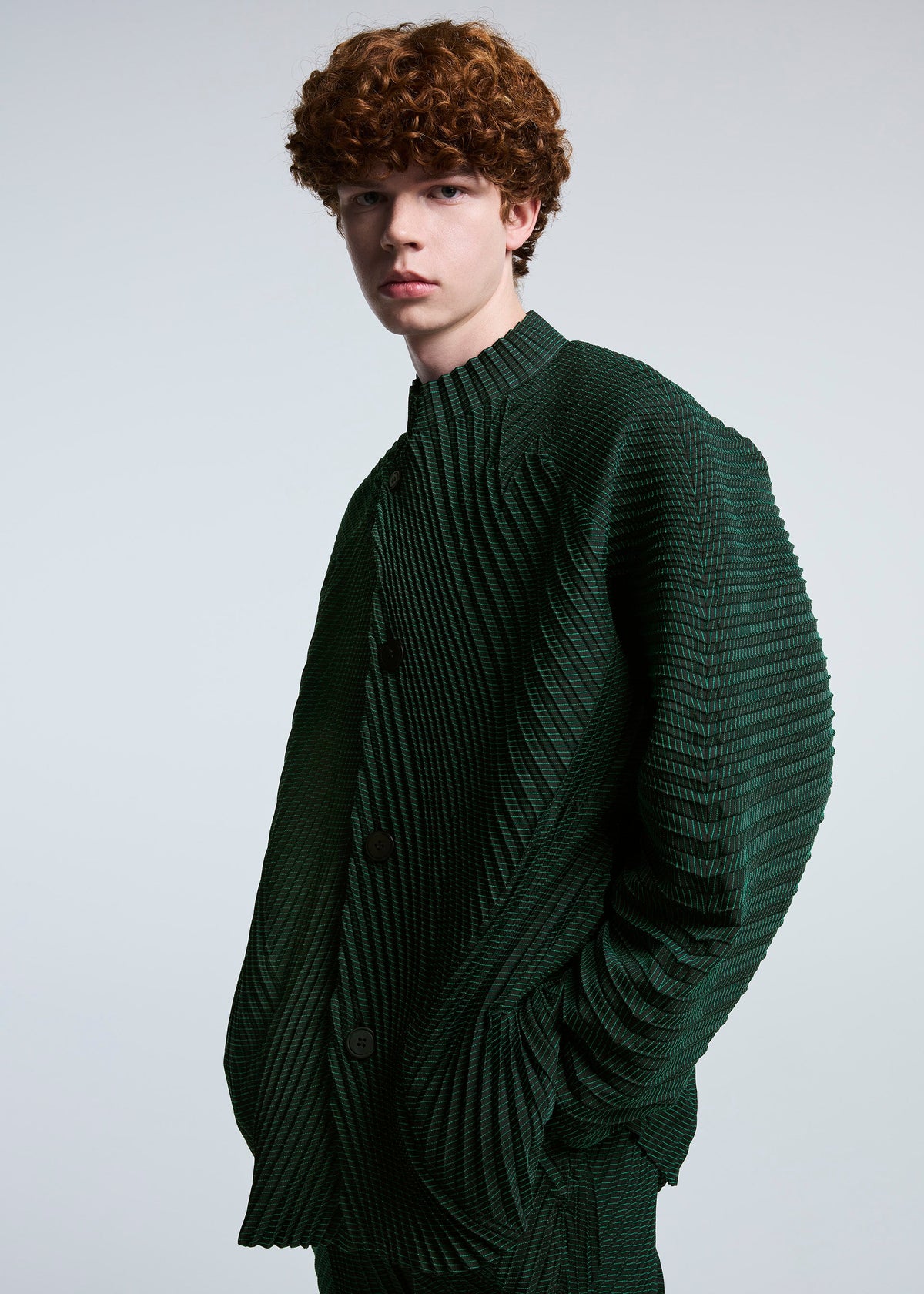 A model wears the A-POC ABLE ISSEY MIYAKE TYPE O 006 jacket.