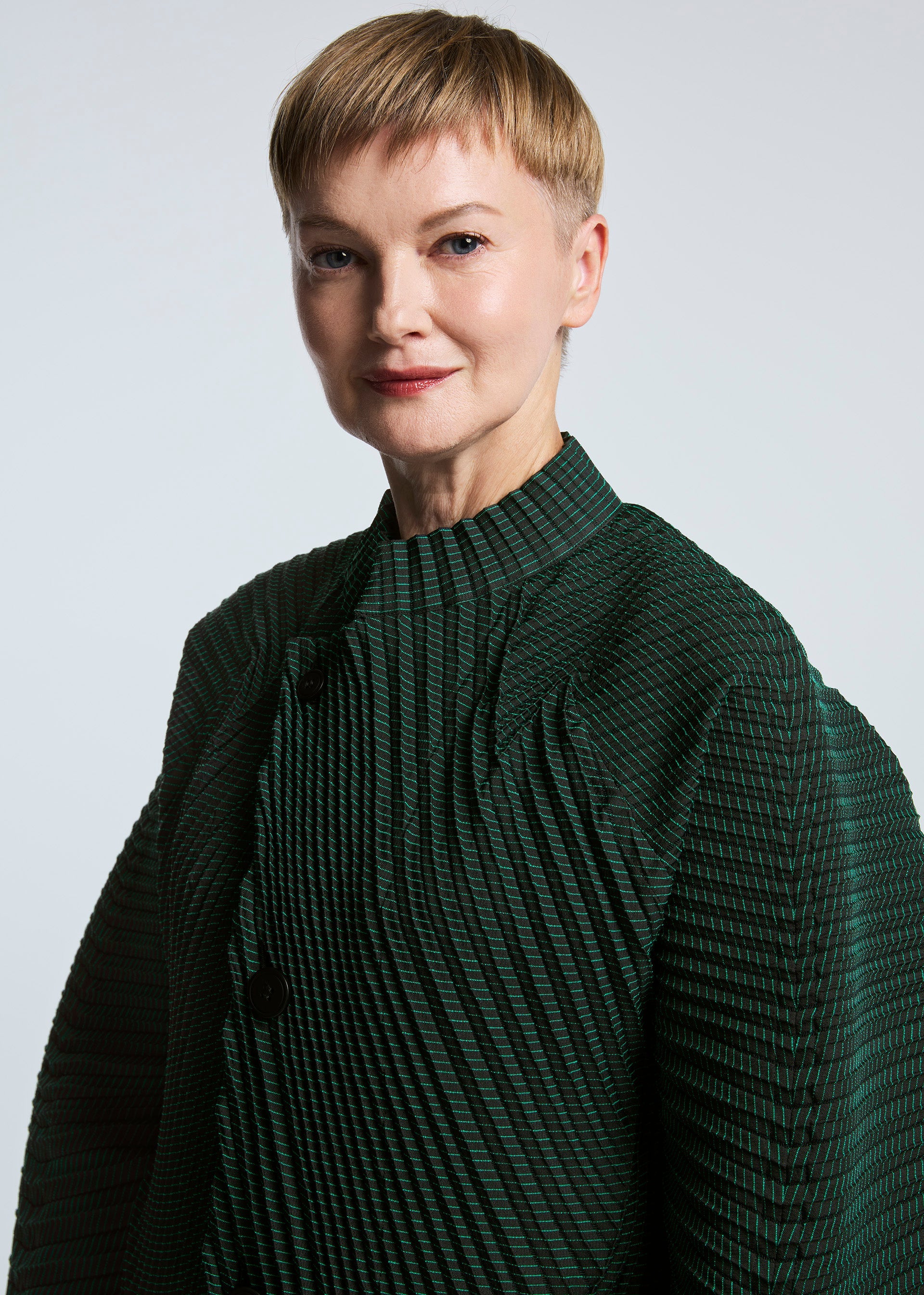 A model wears the A-POC ABLE ISSEY MIYAKE TYPE O 006 jacket.