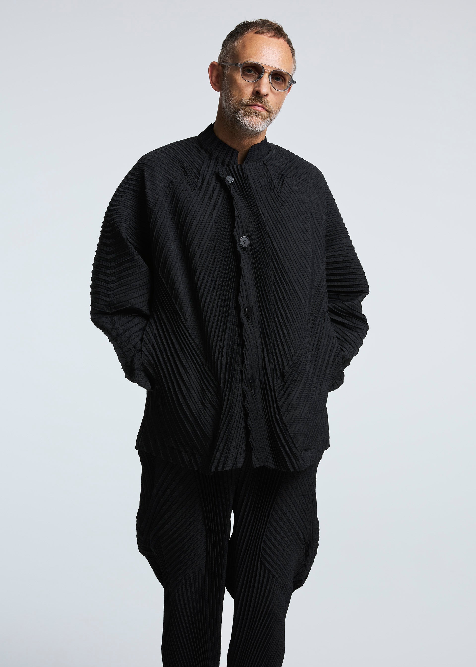 A model wears the A-POC ABLE ISSEY MIYAKE TYPE O 006 jacket.
