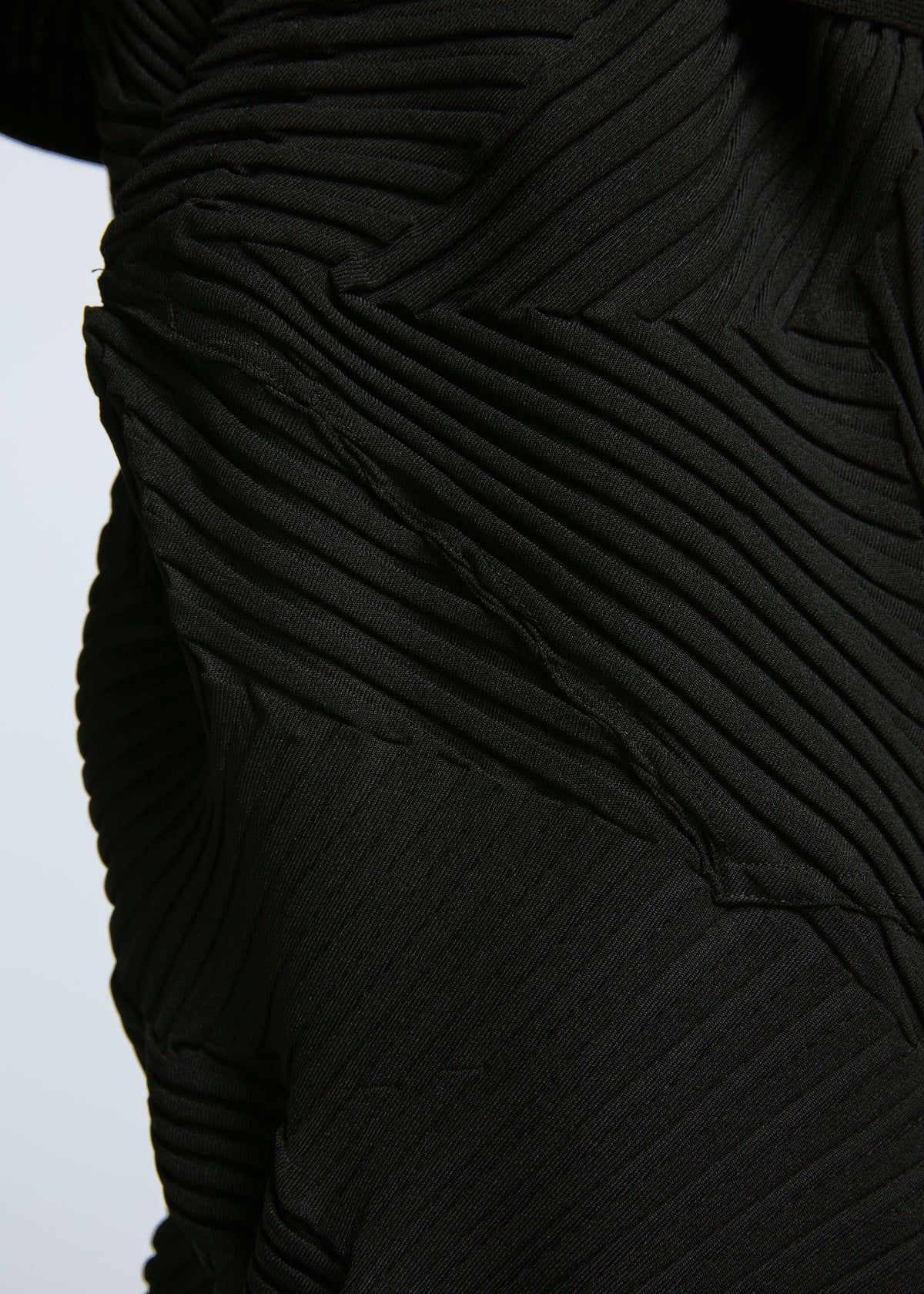 A model wears the A-POC ABLE ISSEY MIYAKE TYPE P 003 trousers.
