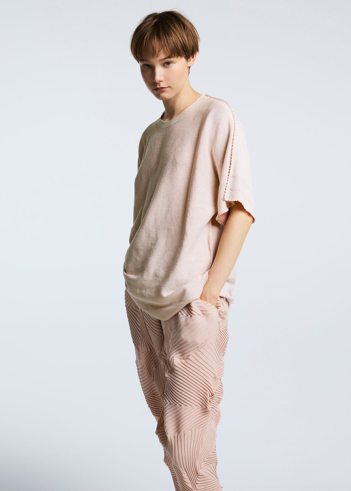 A model wears the A-POC ABLE ISSEY MIYAKE TYPE P 003 trousers.