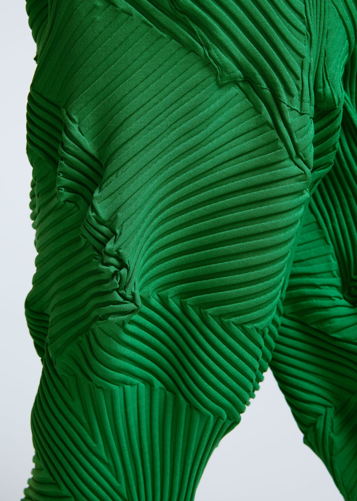 A model wears the A-POC ABLE ISSEY MIYAKE TYPE P 003 trousers.