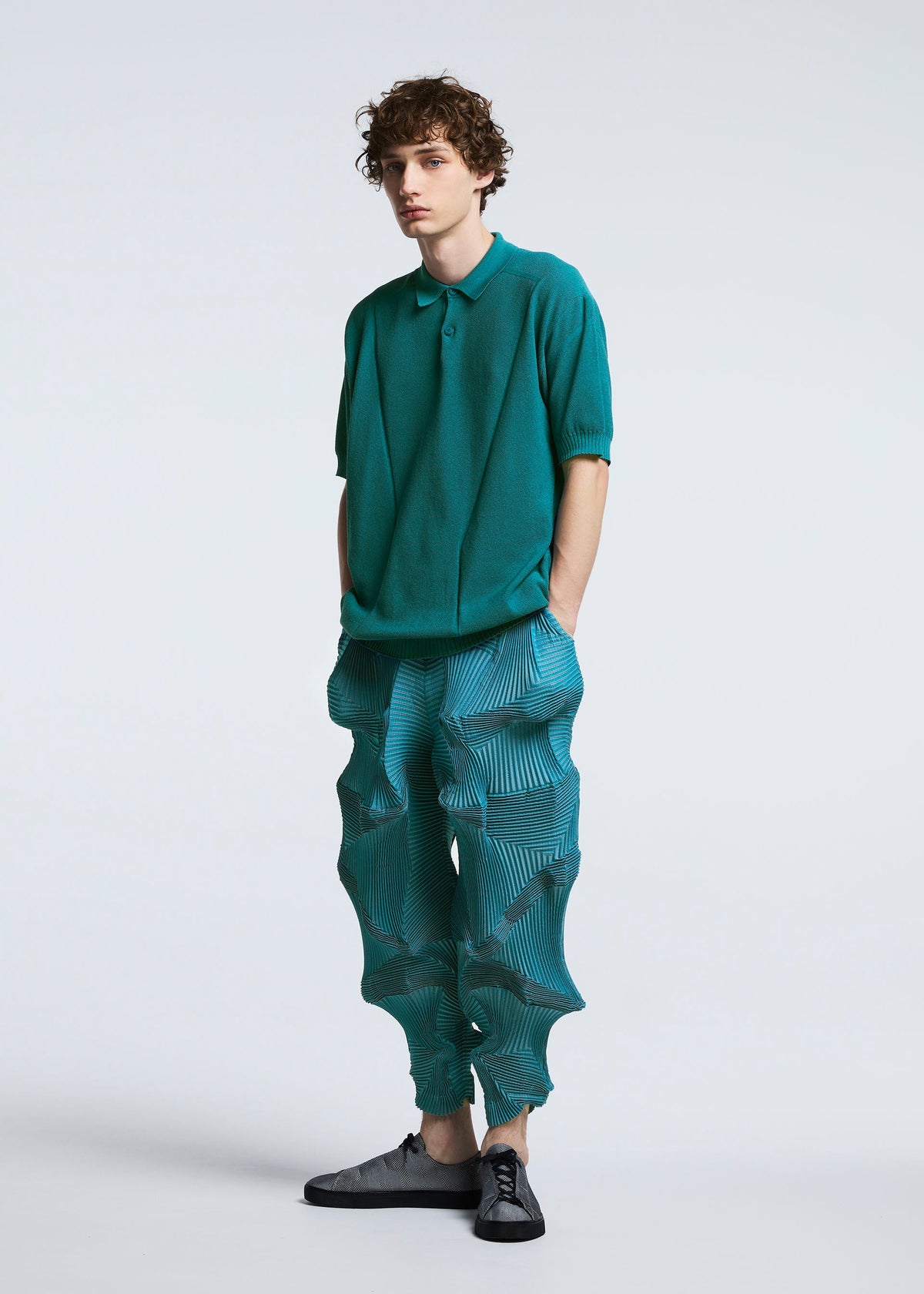 A model wears the A-POC ABLE ISSEY MIYAKE TYPE O 003 trousers.