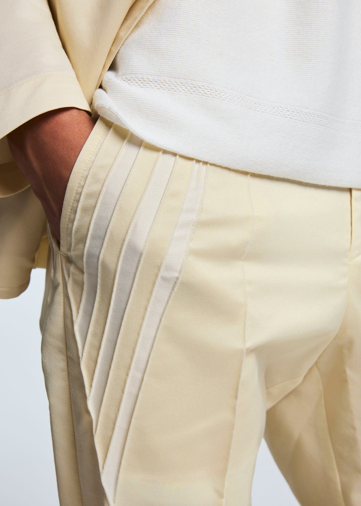 A model wears the A-POC ABLE ISSEY MIYAKE TYPE S 001 1 trousers.
