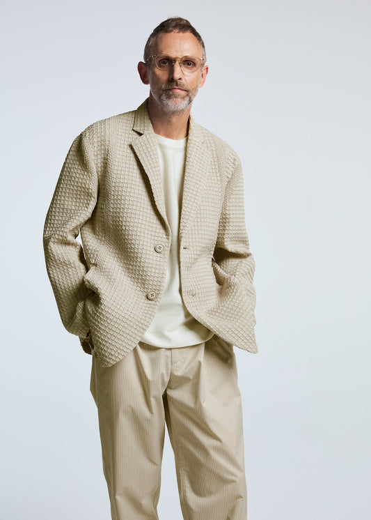 A model wears the A-POC ABLE ISSEY MIYAKE TYPE S 003 trousers.