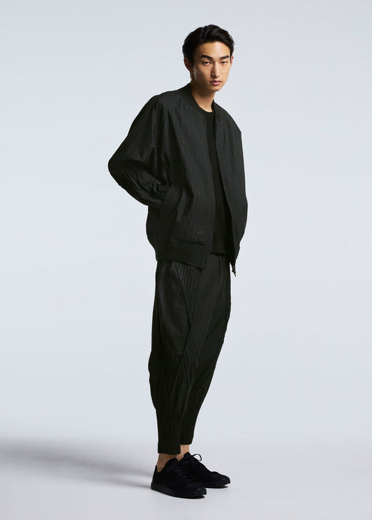 A model wears the A-POC ABLE ISSEY MIYAKE TYPE S 001 2 trousers.