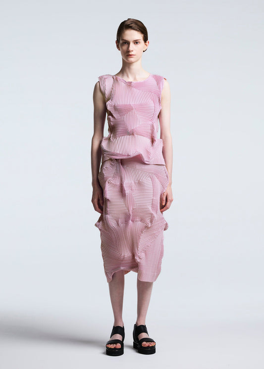 A model wears the A-POC ABLE ISSEY MIYAKE TYPE O 003 skirt.