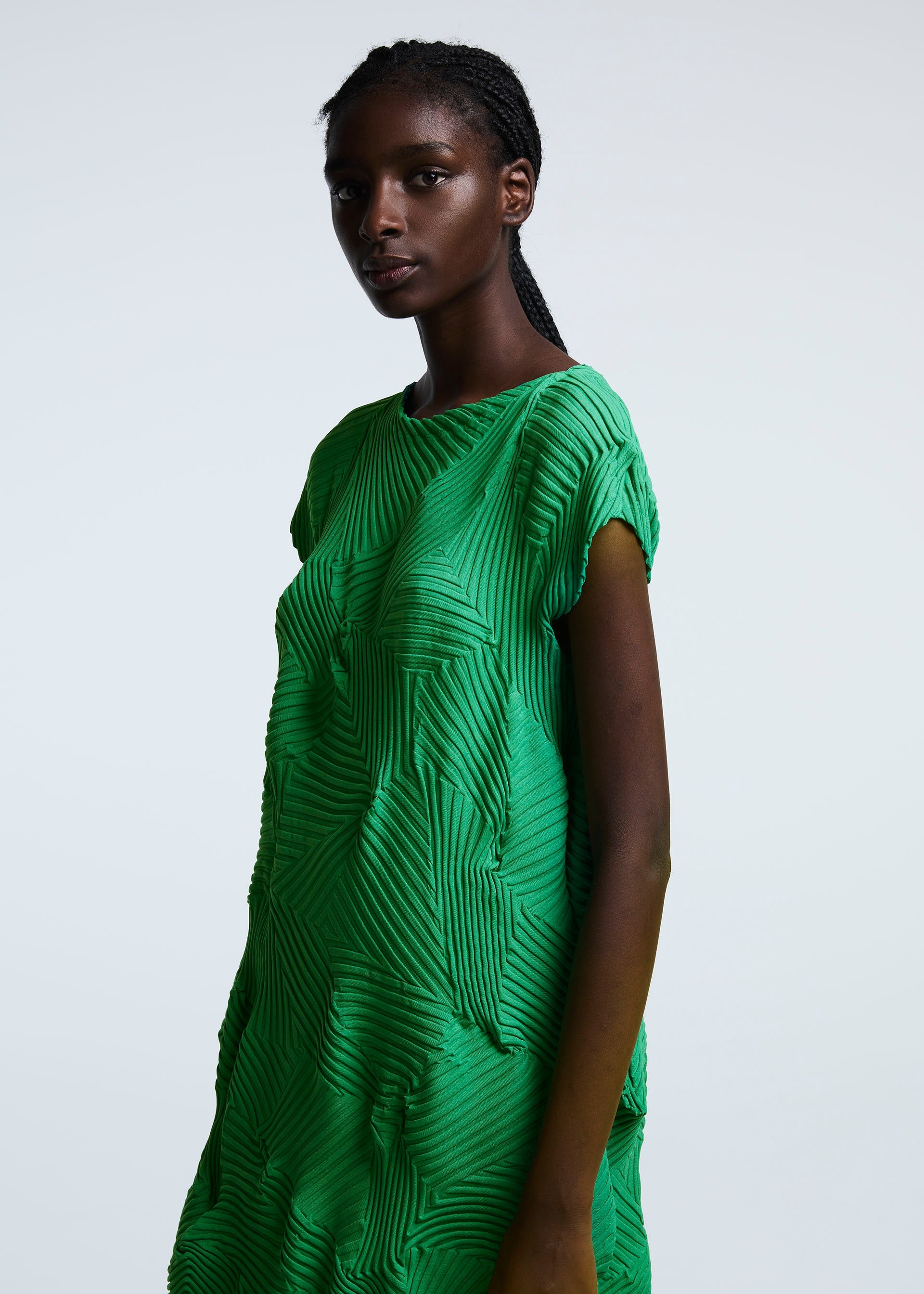 A model wears the A-POC ABLE ISSEY MIYAKE TYPE P 003 dress.