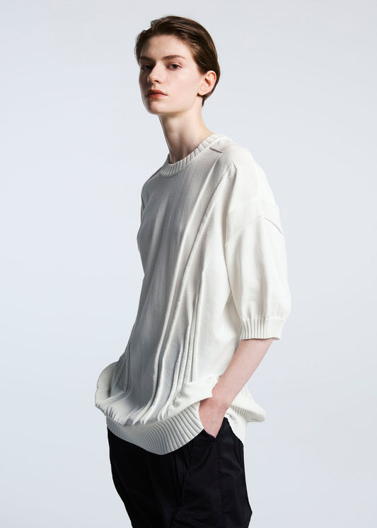 A model wears the A-POC ABLE ISSEY MIYAKE TYPE K 003 2 top.