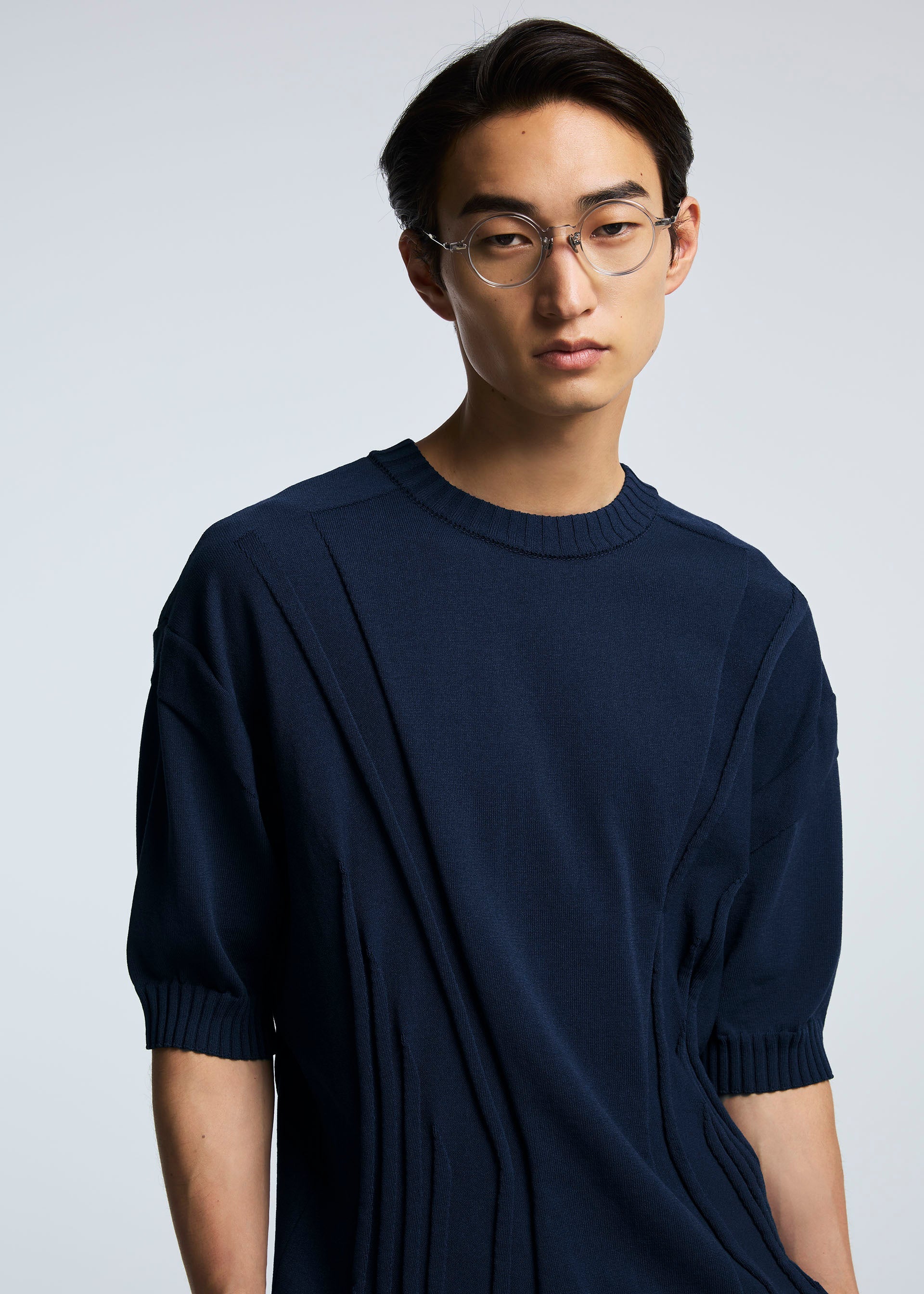 A model wears the A-POC ABLE ISSEY MIYAKE TYPE K 003 2 top.