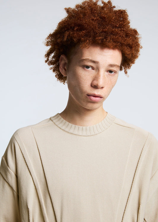 A model wears the A-POC ABLE ISSEY MIYAKE TYPE K 003 4 top.