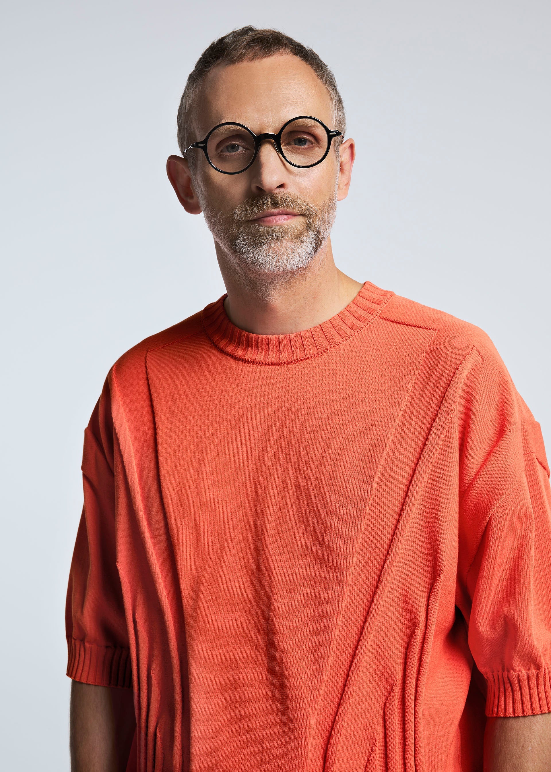 A model wears the A-POC ABLE ISSEY MIYAKE TYPE K 003 4 top.