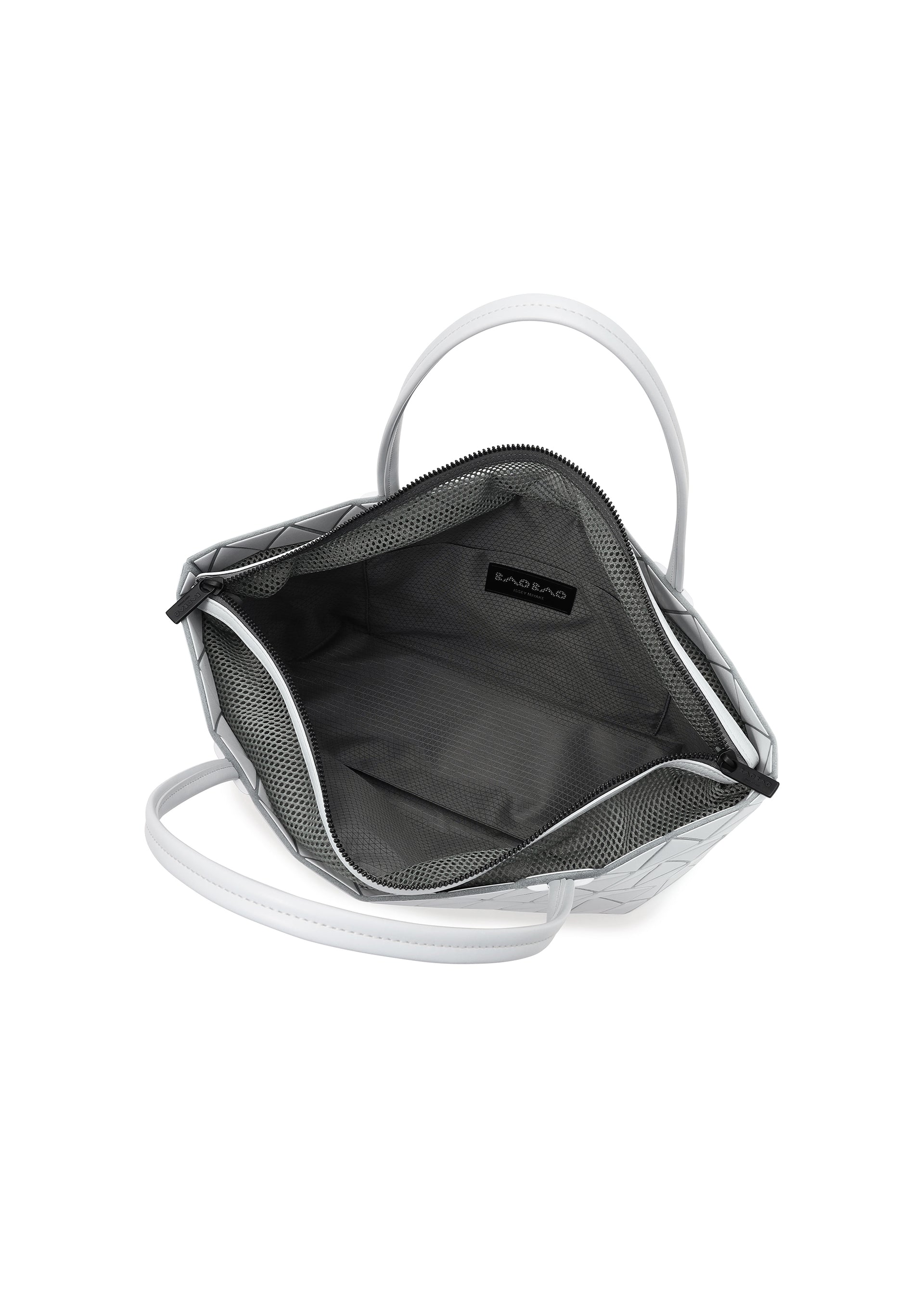 A detail shot of the BAO BAO ISSEY MIYAKE BATEAU MATTE hand bag.