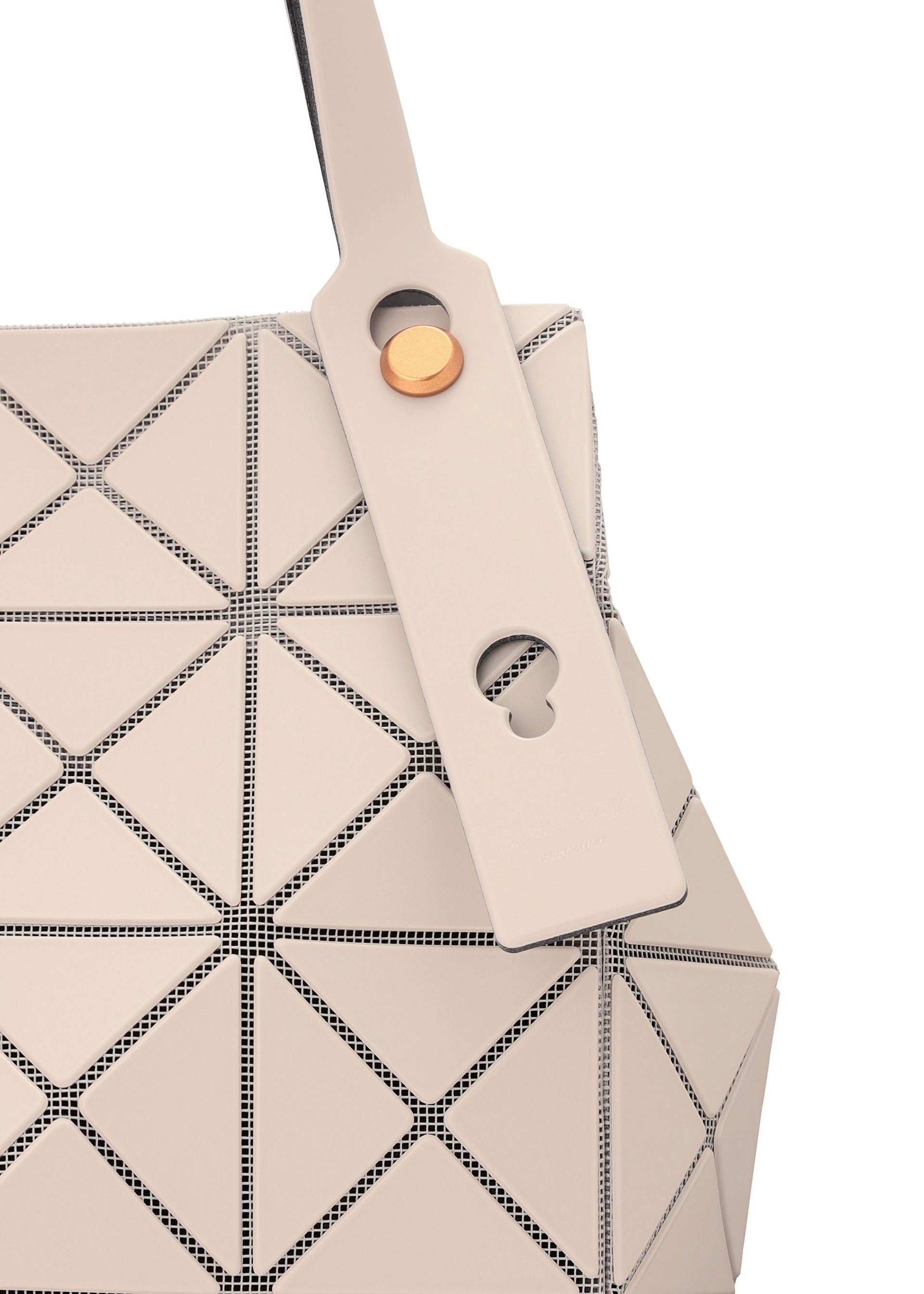 A detail shot of the BAO BAO ISSEY MIYAKE CARAT hand bag.