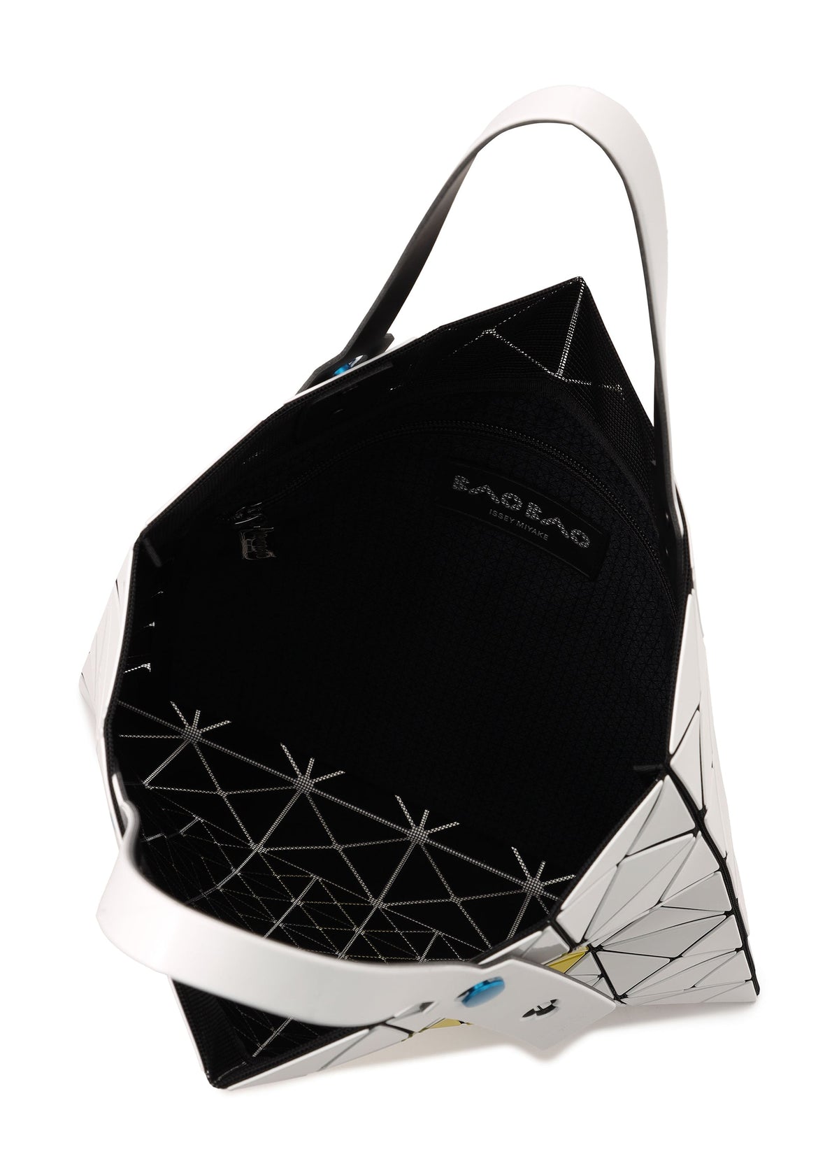 A detail shot of the BAO BAO ISSEY MIYAKE FRUITS tote.