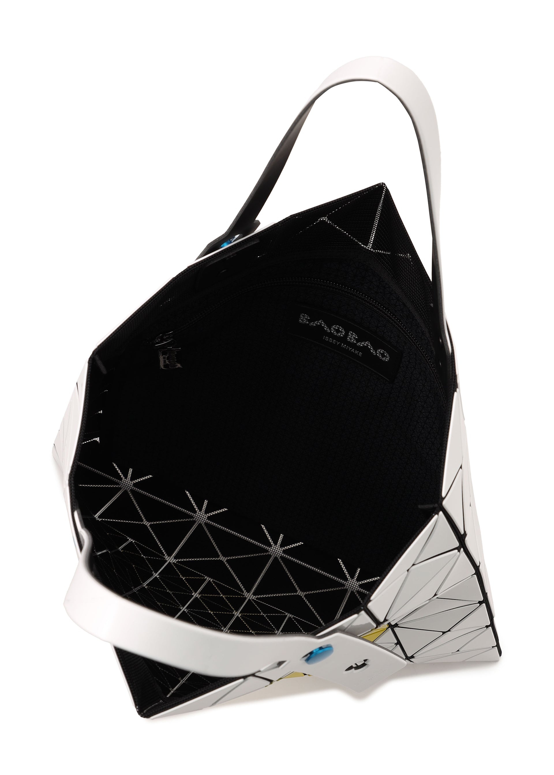 A detail shot of the BAO BAO ISSEY MIYAKE FRUITS tote.