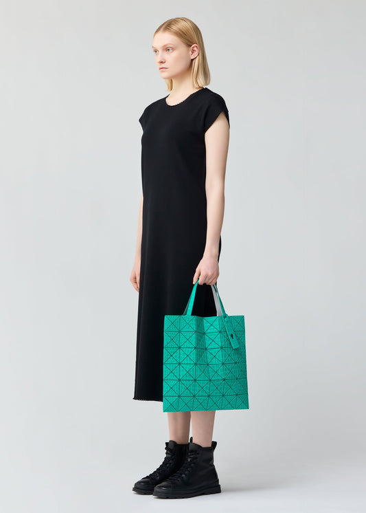 A model wears the BAO BAO ISSEY MIYAKE KAIJU tote.