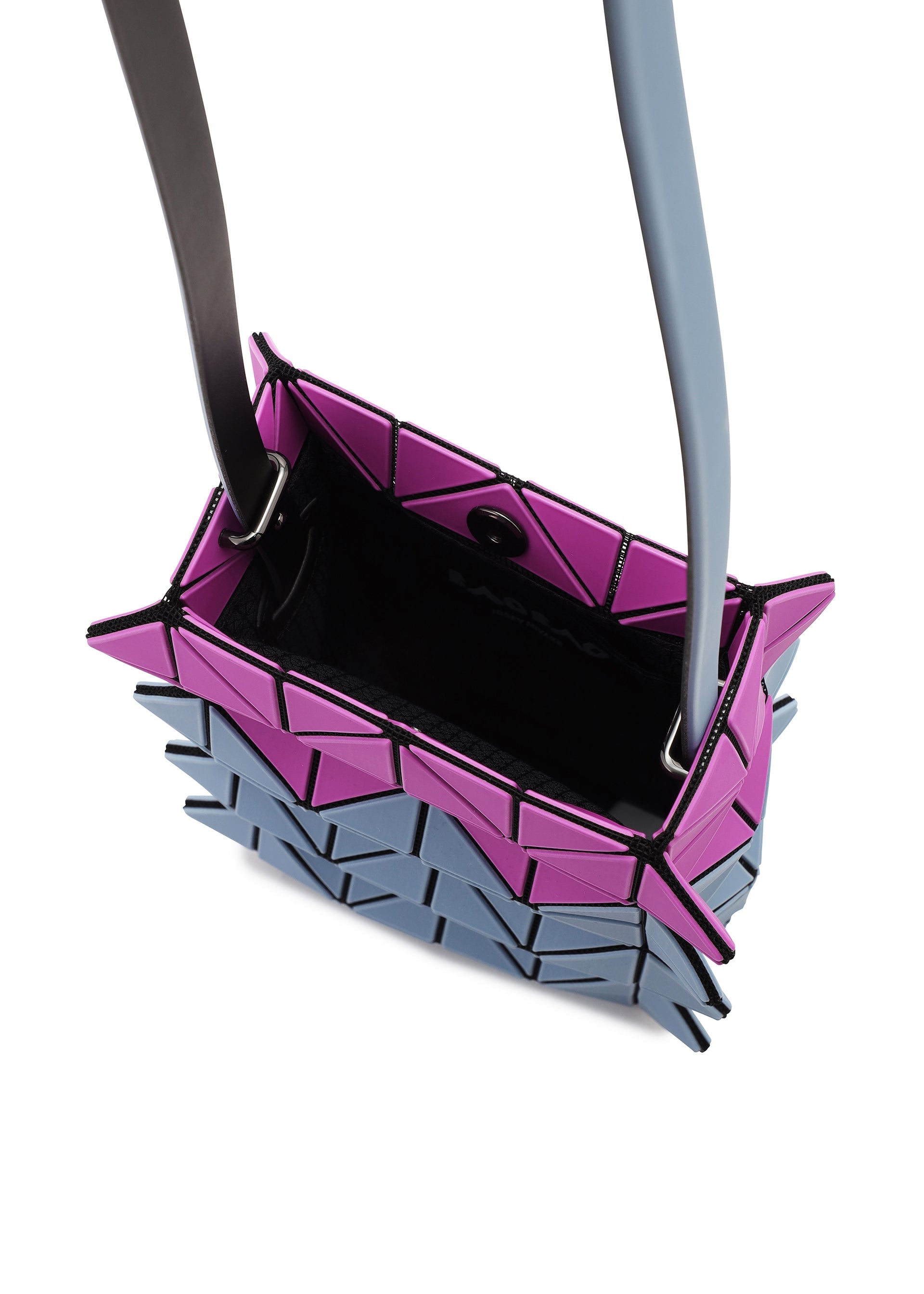 A detail shot of the BAO BAO ISSEY MIYAKE GROWTH shoulder bag.