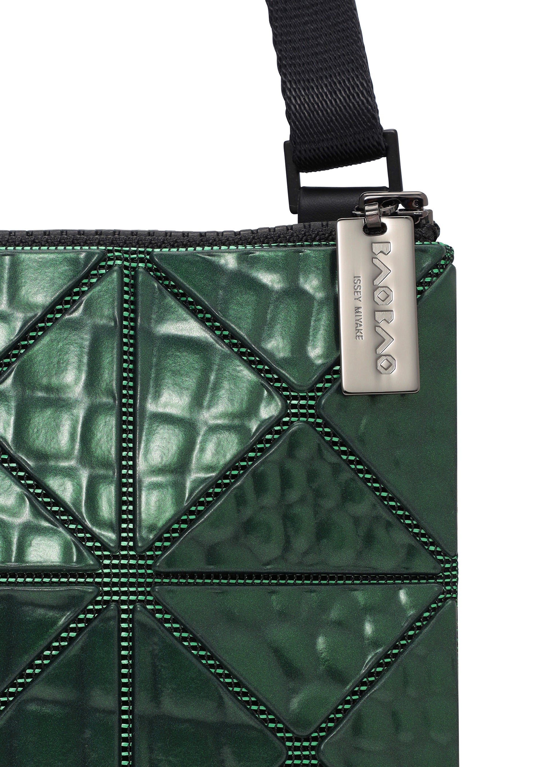 A detail shot of the BAO BAO ISSEY MIYAKE META KAIJU crossbody.