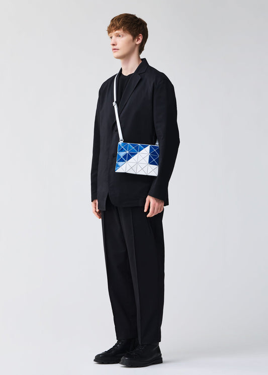 A model wears the BAO BAO ISSEY MIYAKE SIGN shoulder bag.
