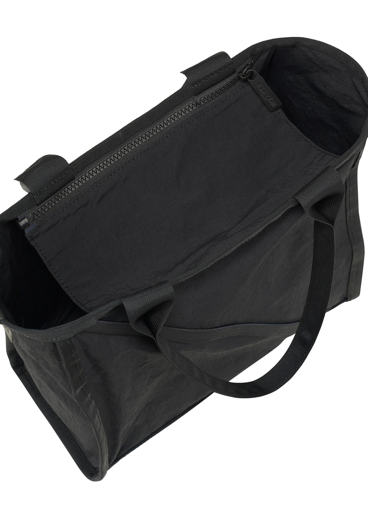 A detail shot of the GOOD GOODS ISSEY MIYAKE WAKU bag.