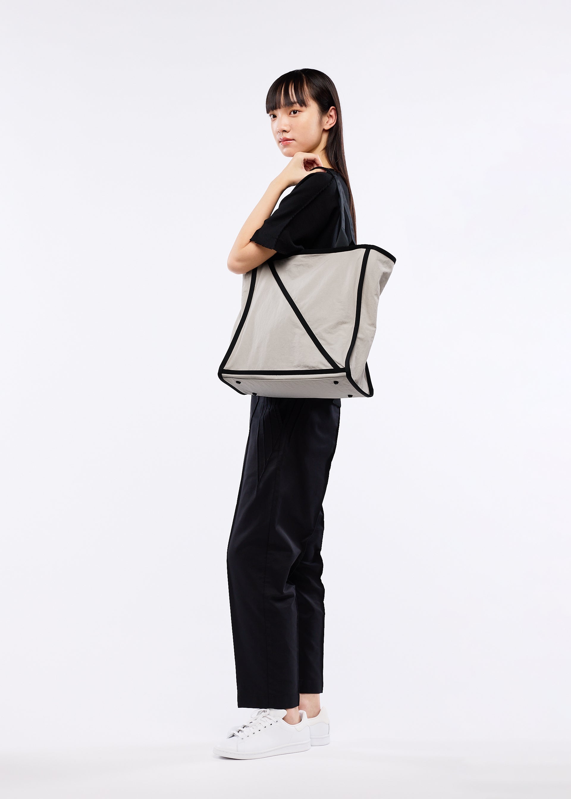 A detail shot of the GOOD GOODS ISSEY MIYAKE WAKU bag.