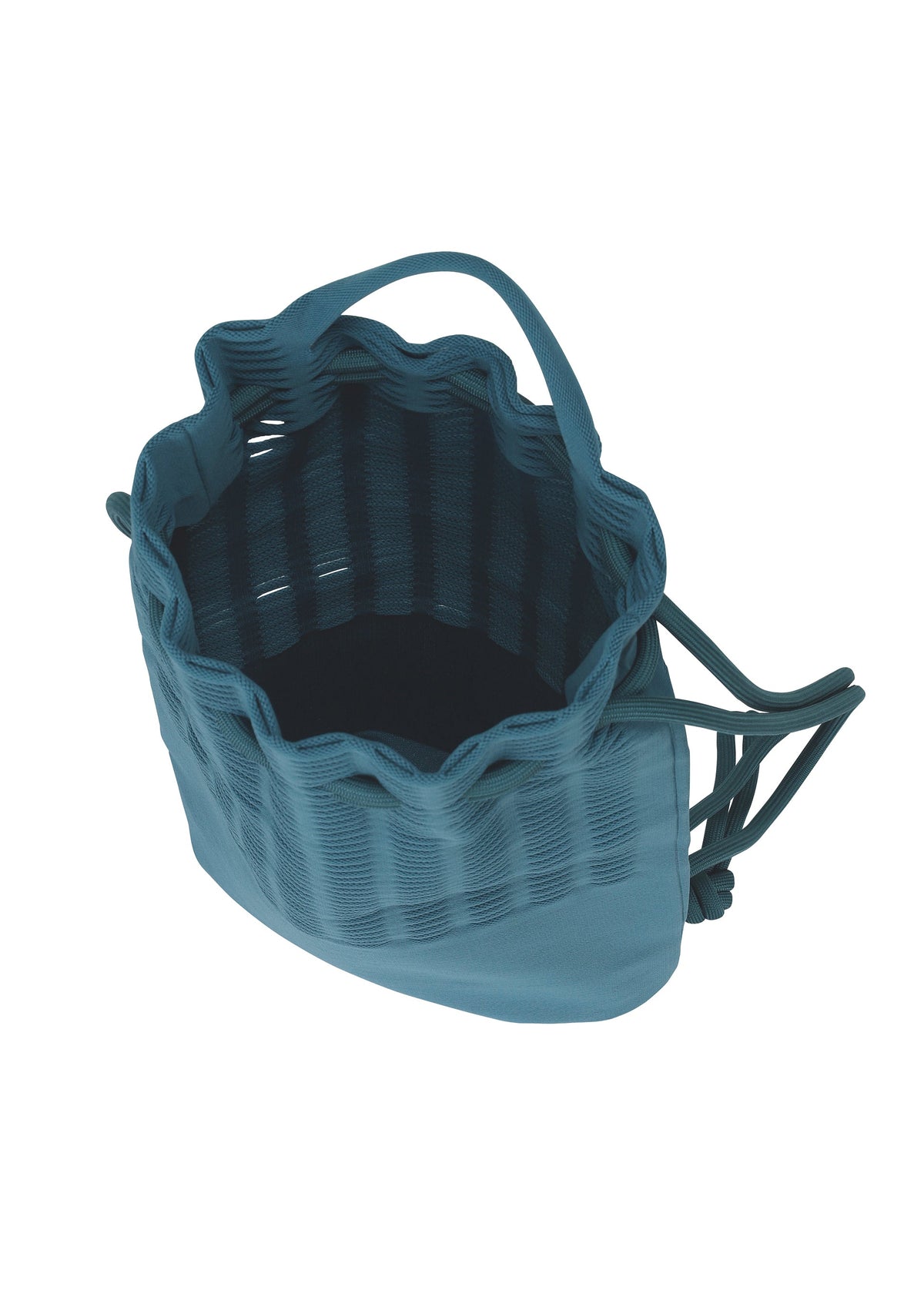 A detail shot of the GOOD GOODS ISSEY MIYAKE MOKKO KNAPSACK bag.