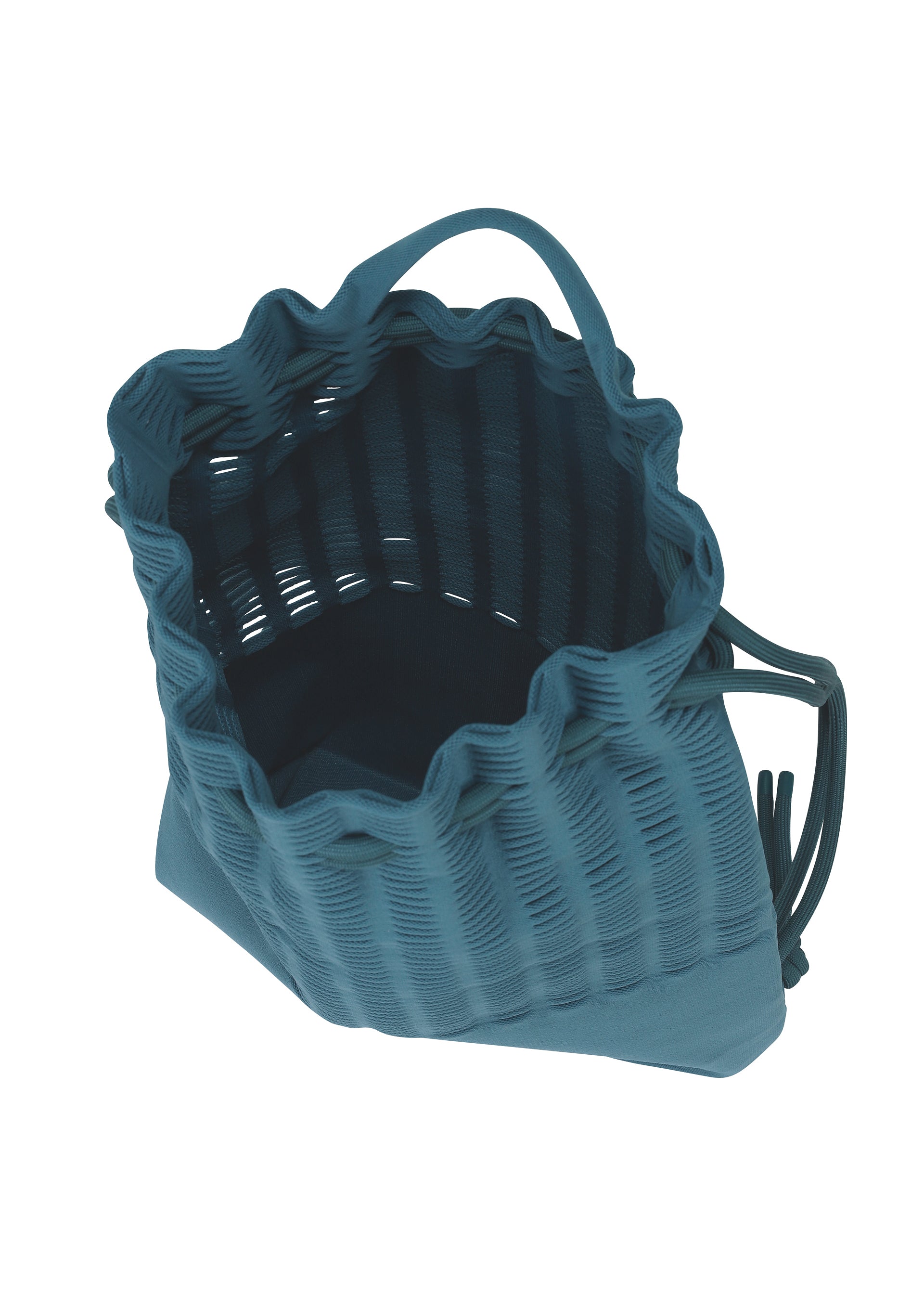 A detail shot of the GOOD GOODS ISSEY MIYAKE MOKKO KNAPSACK bag.