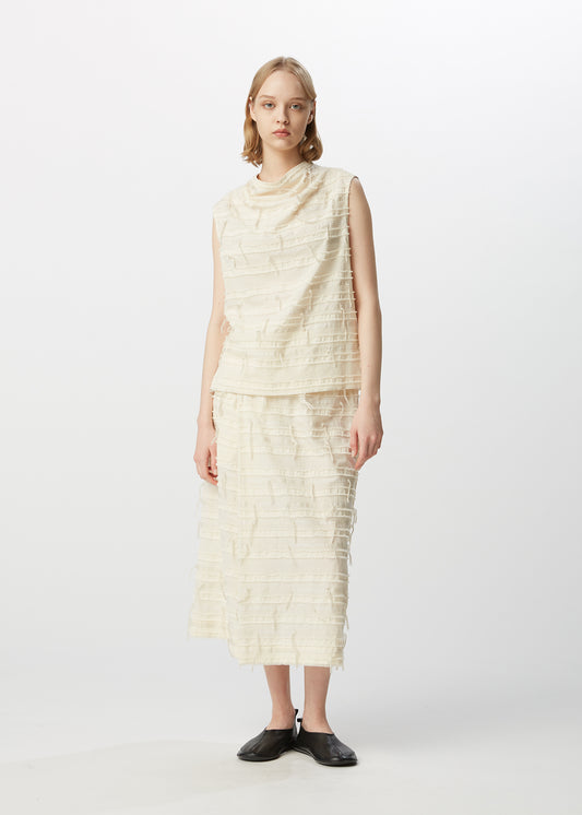 A model wears the HAAT FRINGE MIXED skirt