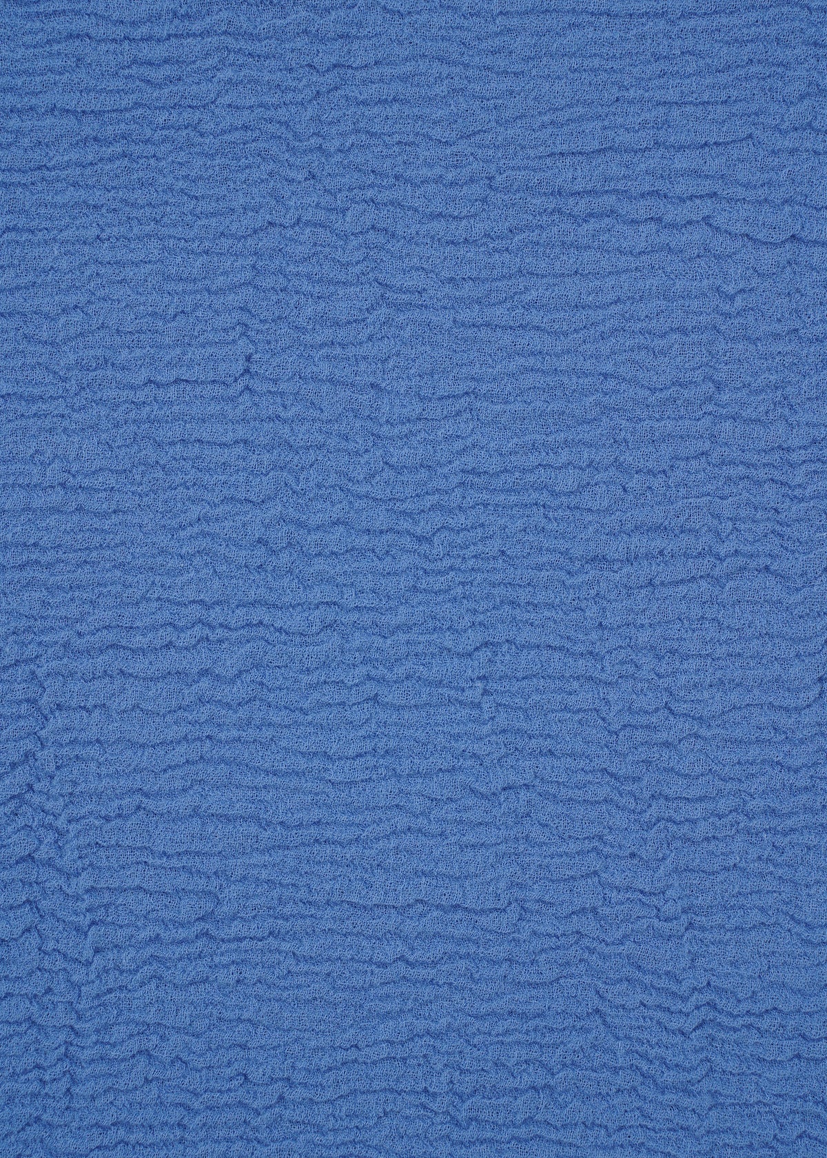 A detail shot of the HAAT KYO CHIJIMI 2WAY top