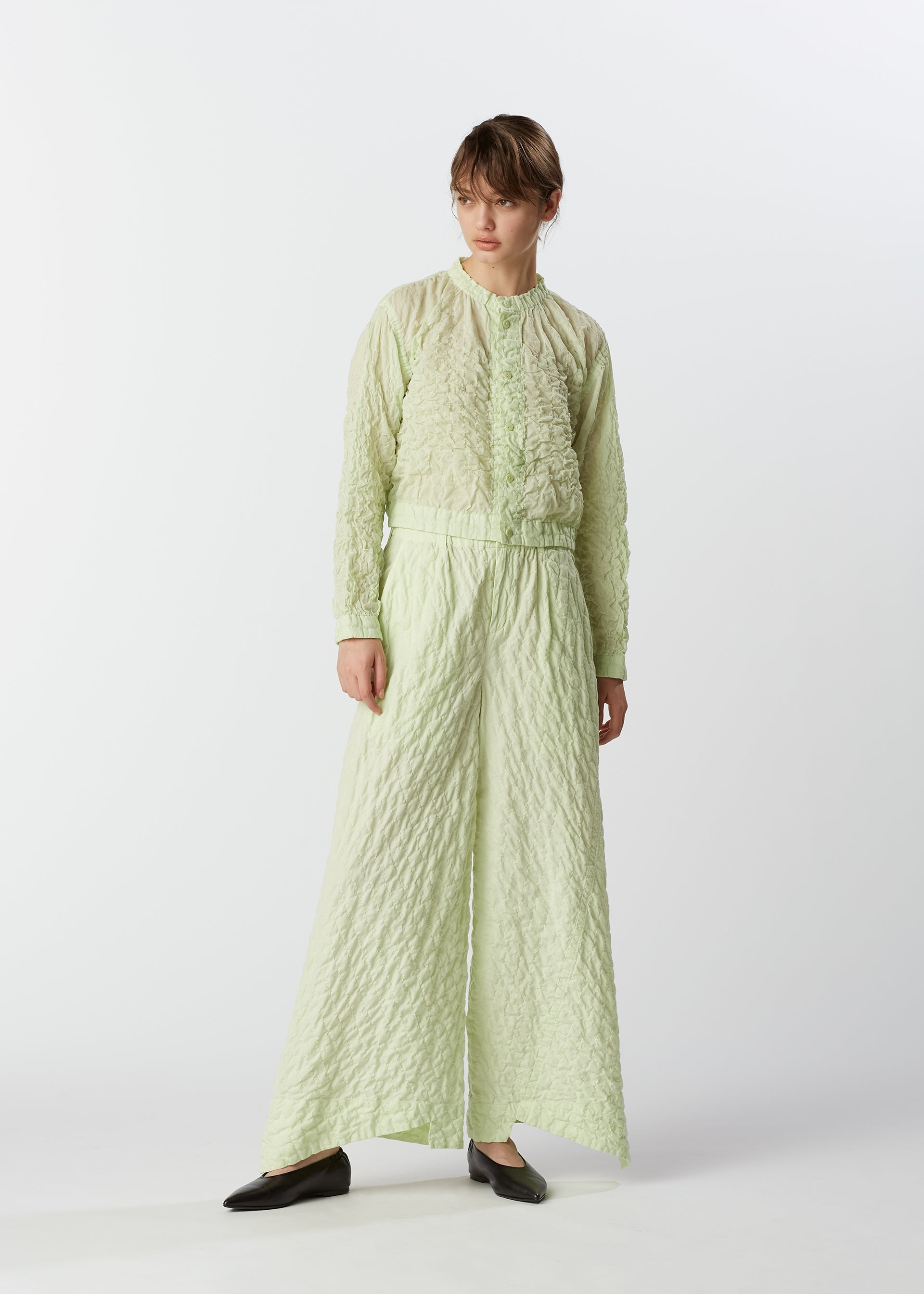 A model wears the HAAT KUMO trousers.