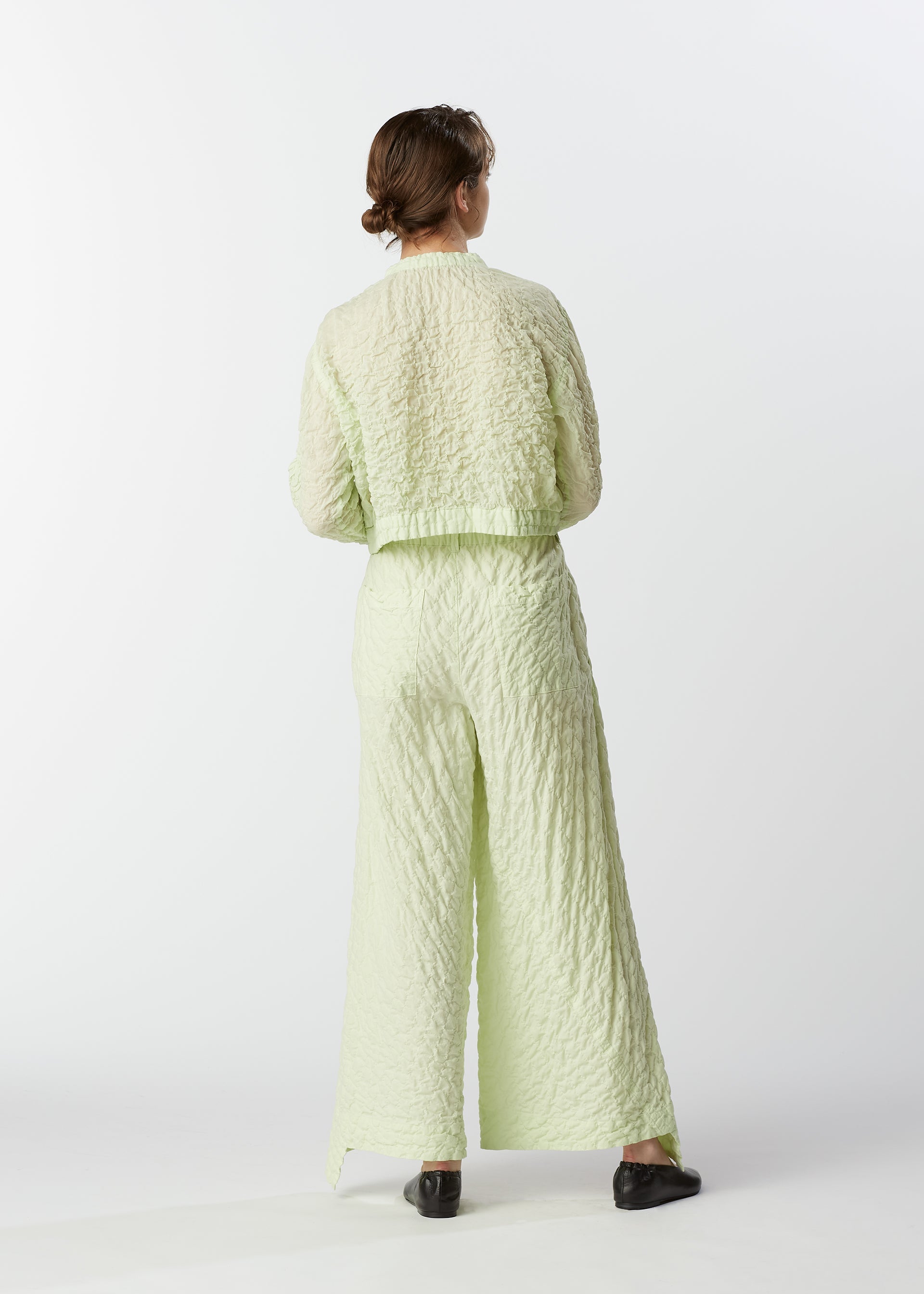 A model wears the HAAT KUMO trousers.