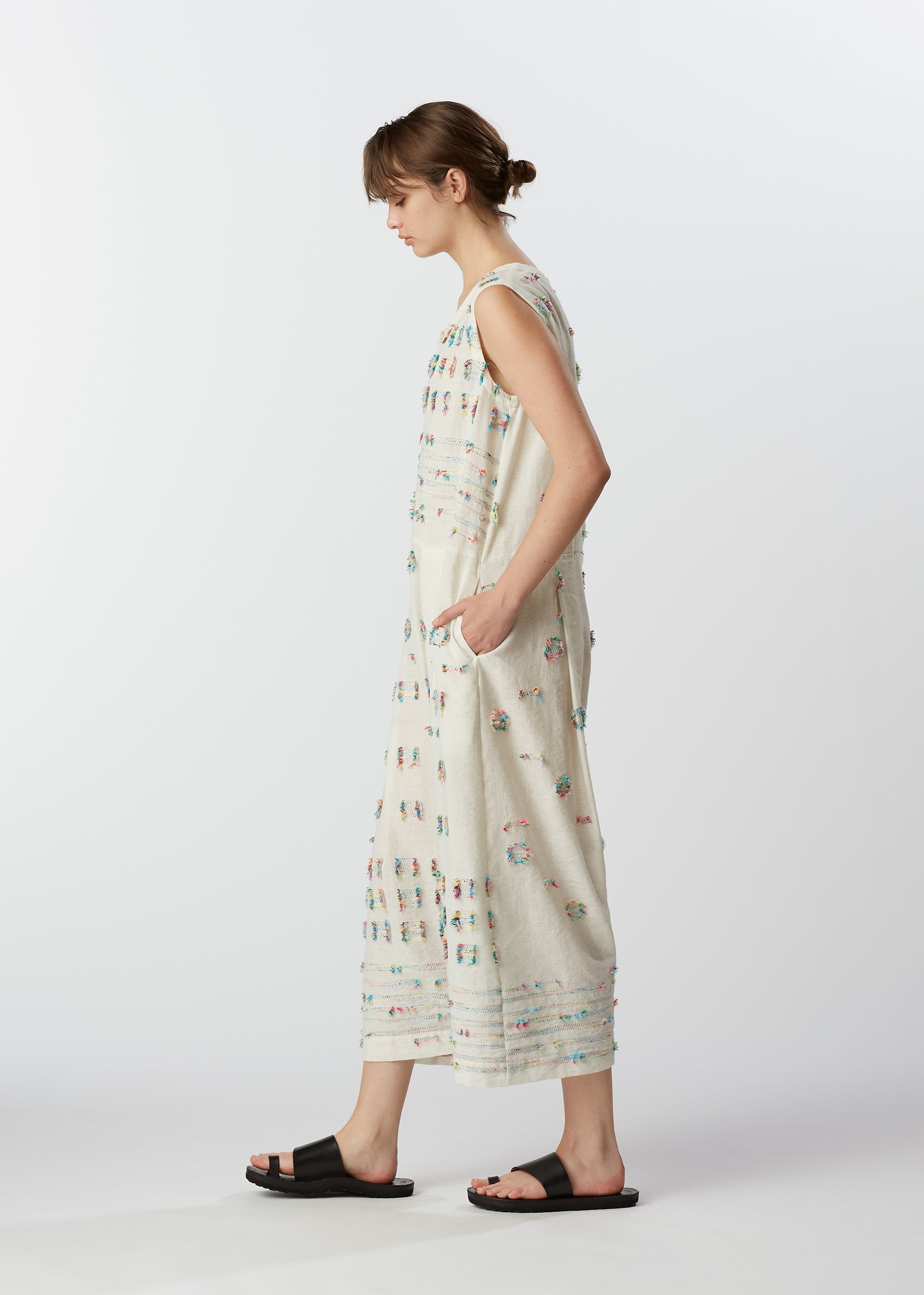 A model wears the HAAT KOMOREBI jumpsuit.