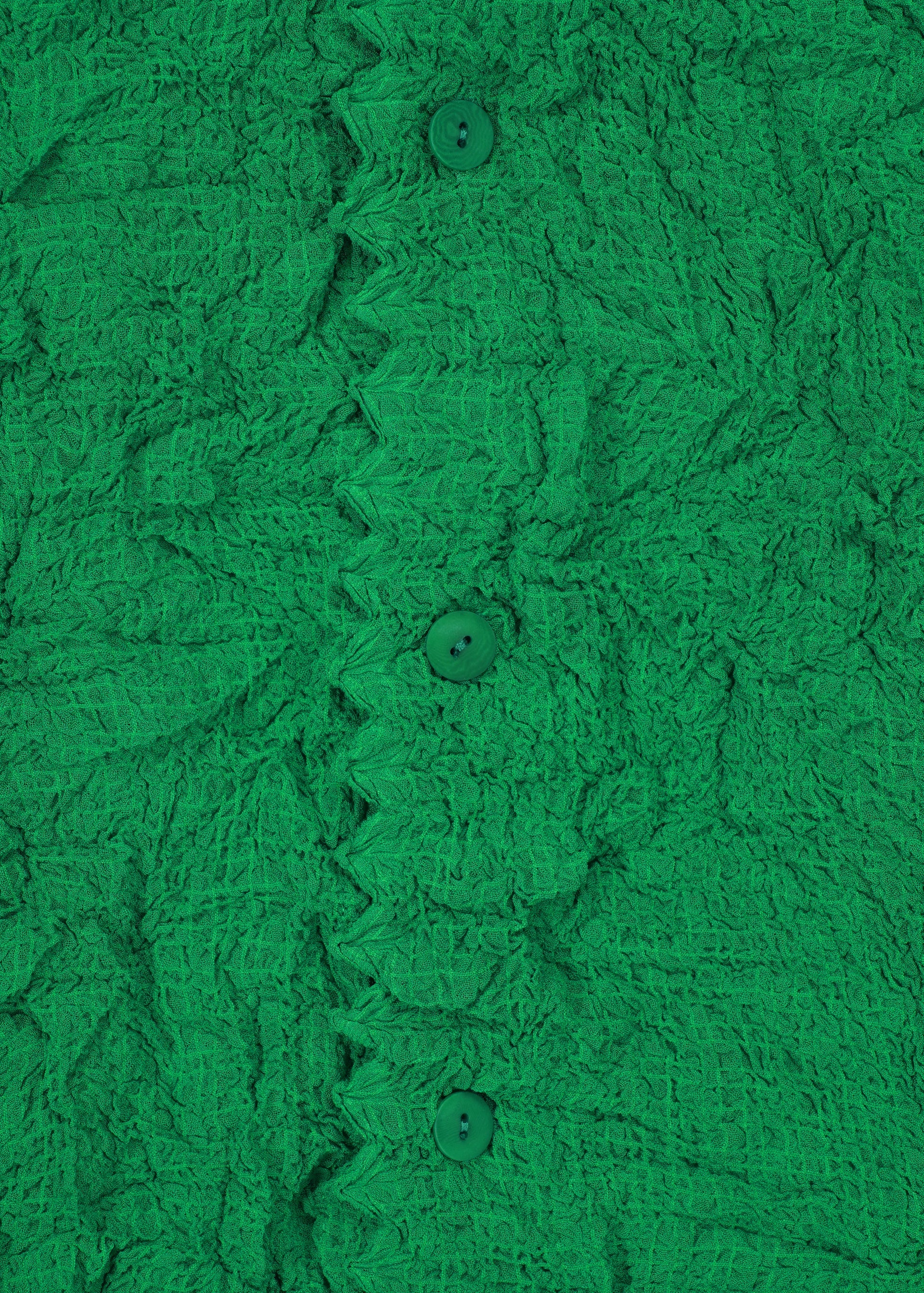 A detail shot of the HAAT KUMO SHIBORI SUCKER shirt.