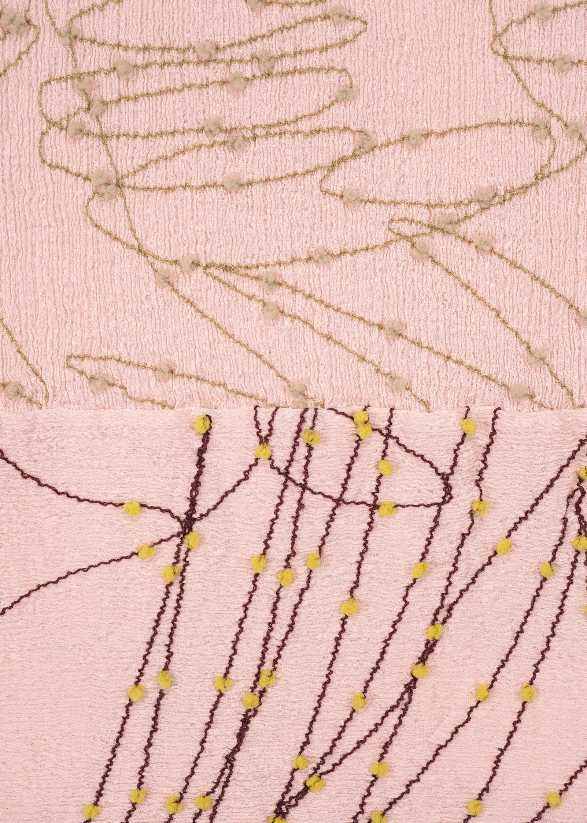 A detail shot of the HAAT KYO CHIJIMI HOTARU shirt.