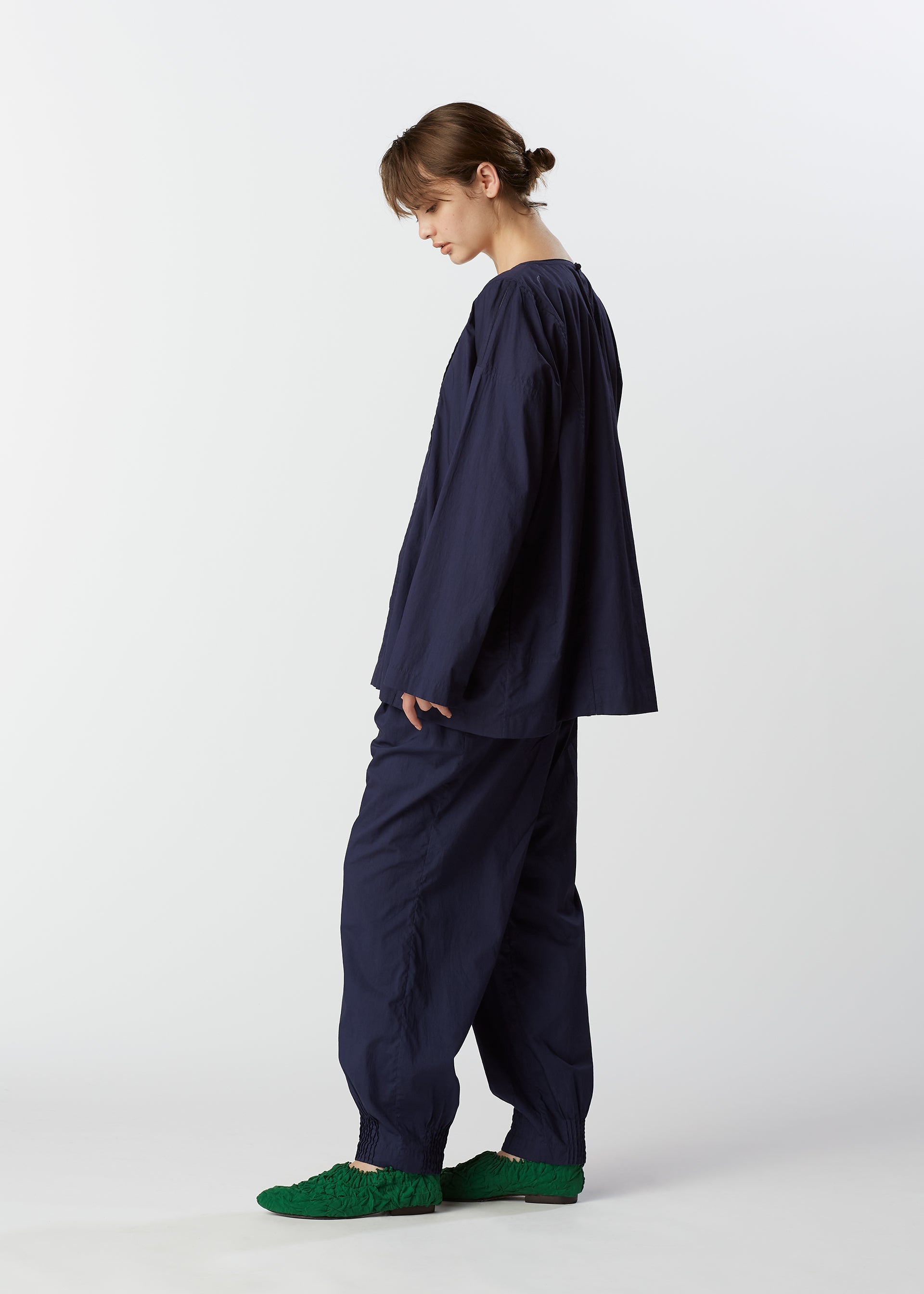A model wears the HAAT BABY JALI shirt.