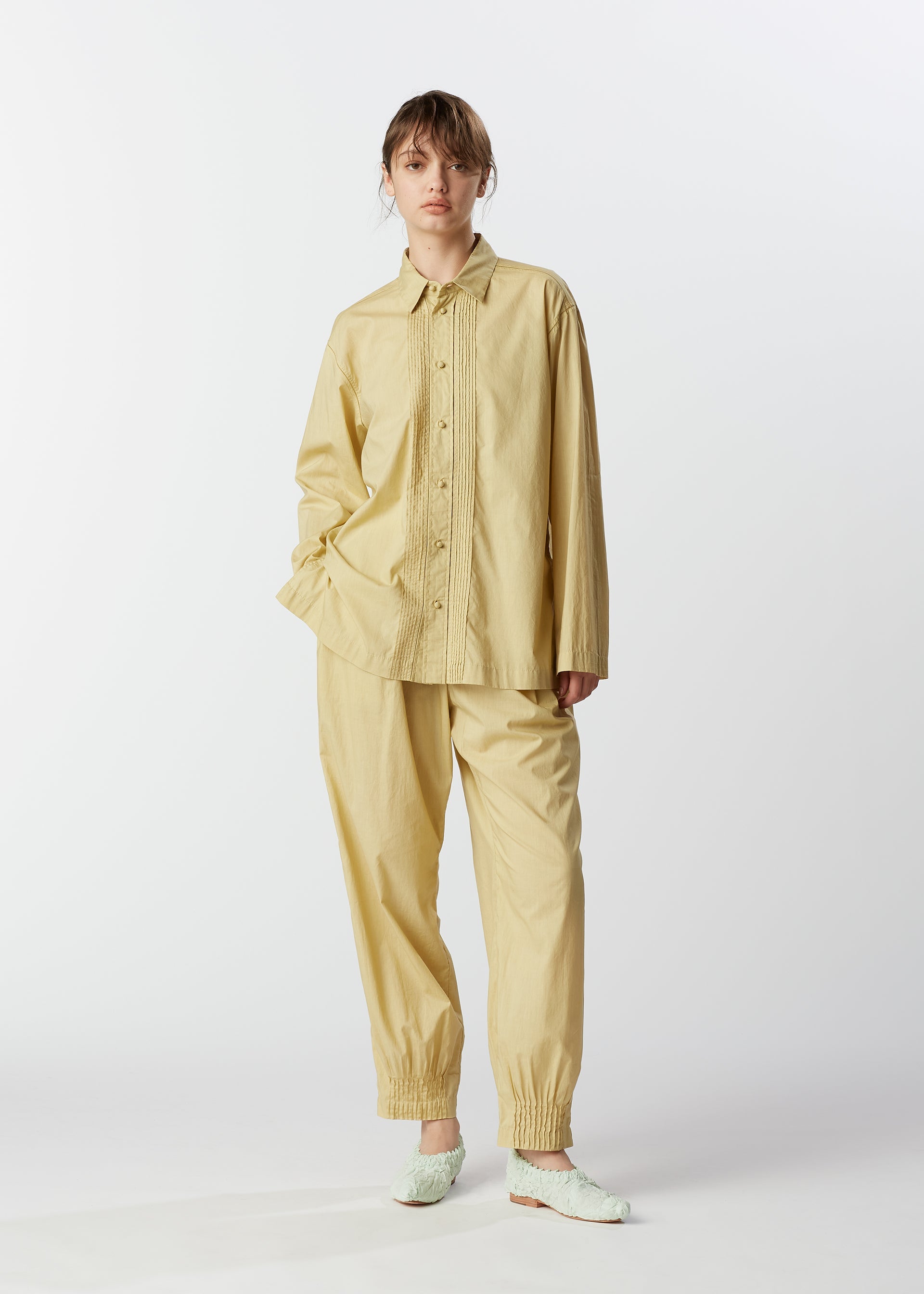 A model wears the HAAT BABY JALI shirt.