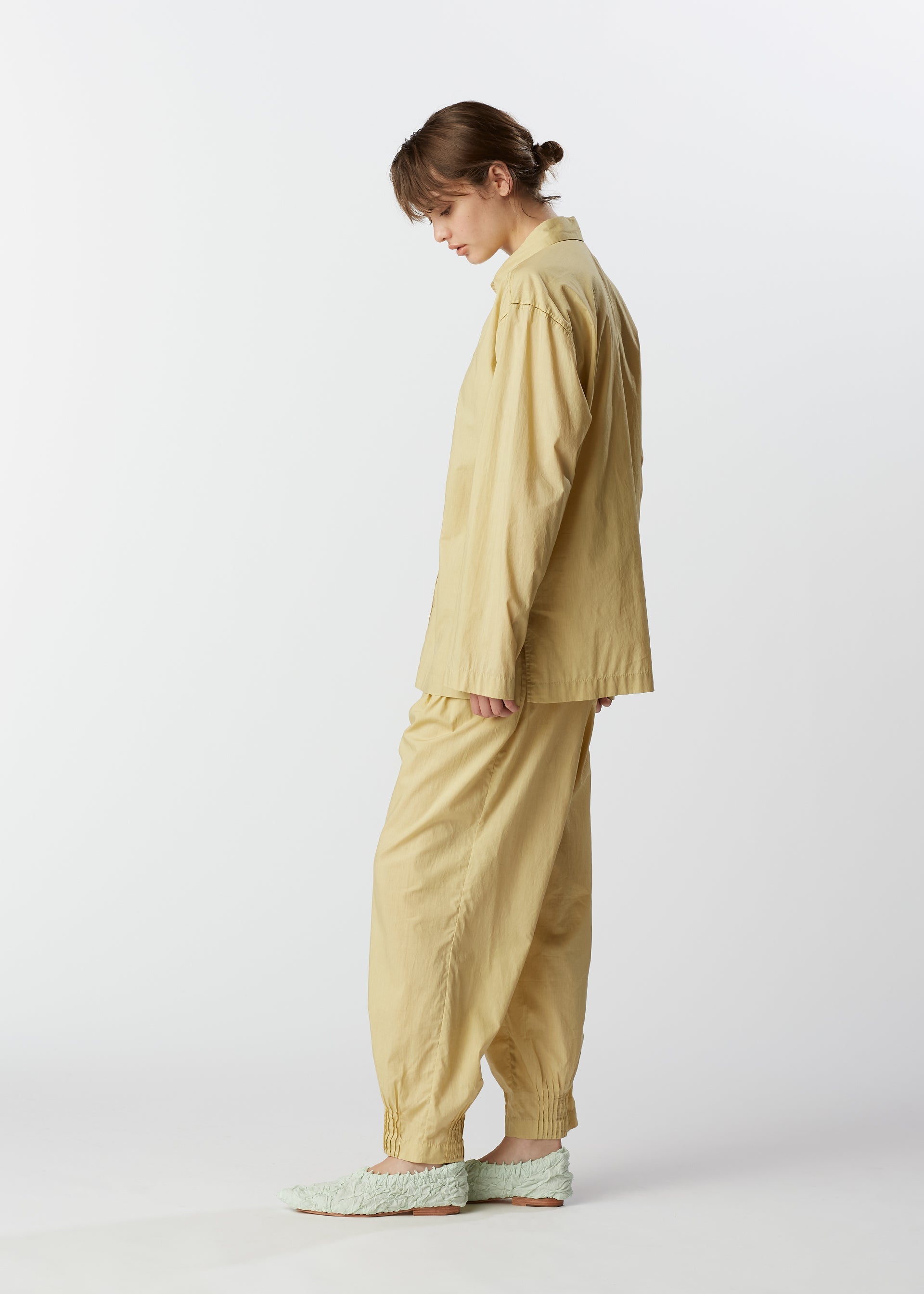 A model wears the HAAT BABY JALI shirt.