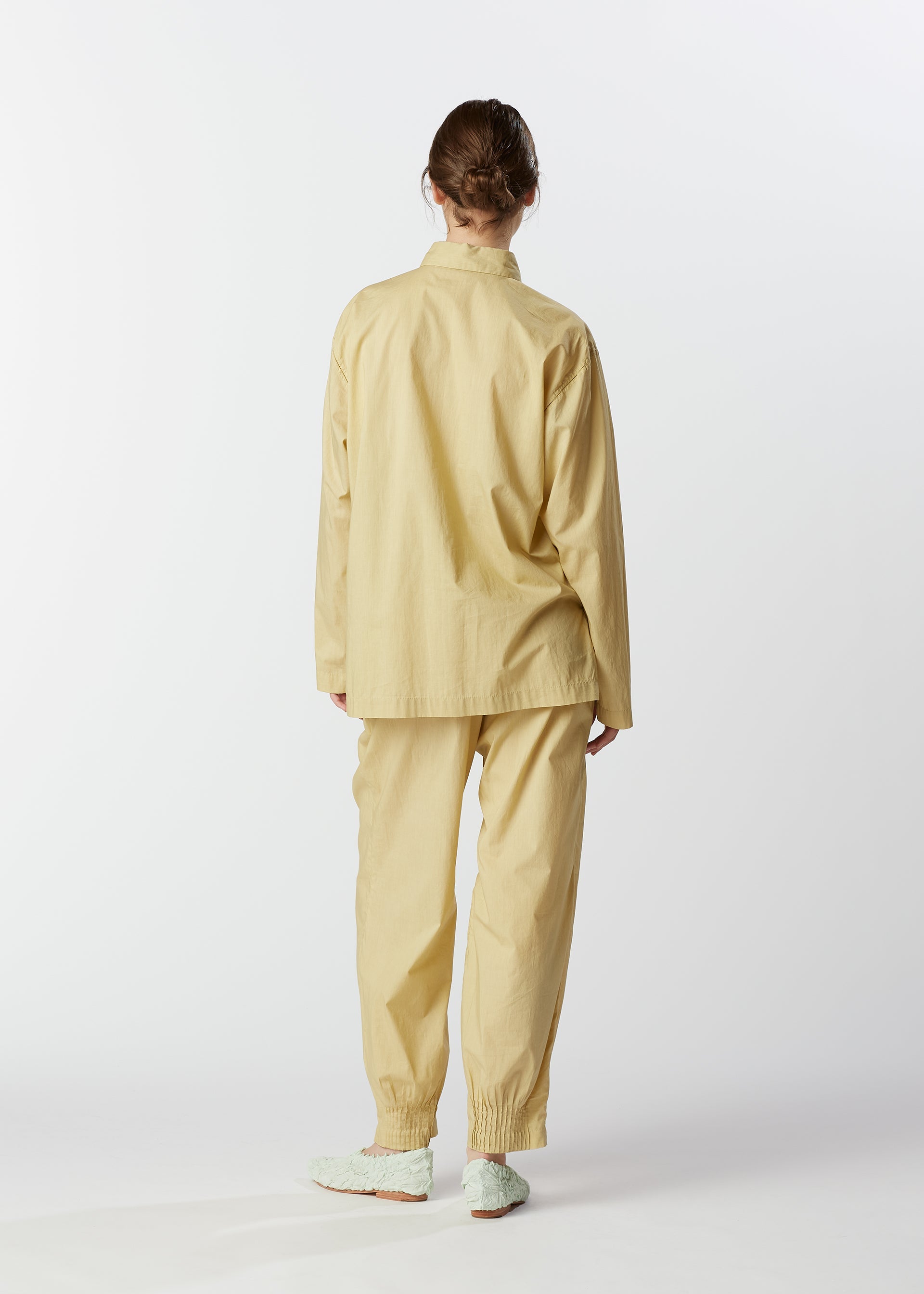 A model wears the HAAT BABY JALI shirt.