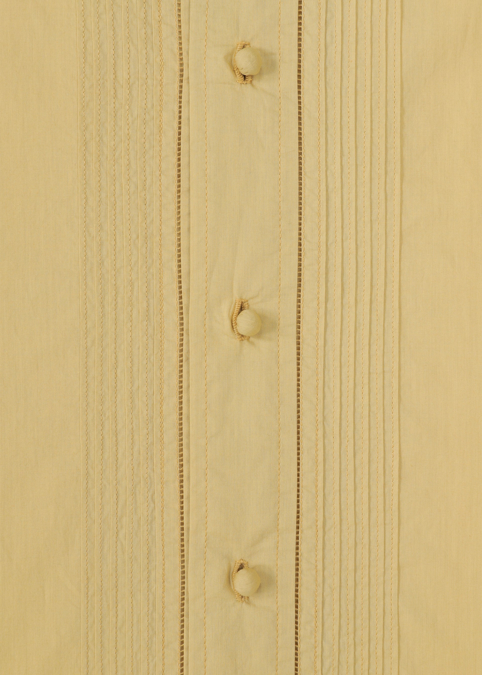 A detail shot of the HAAT BABY JALI shirt.